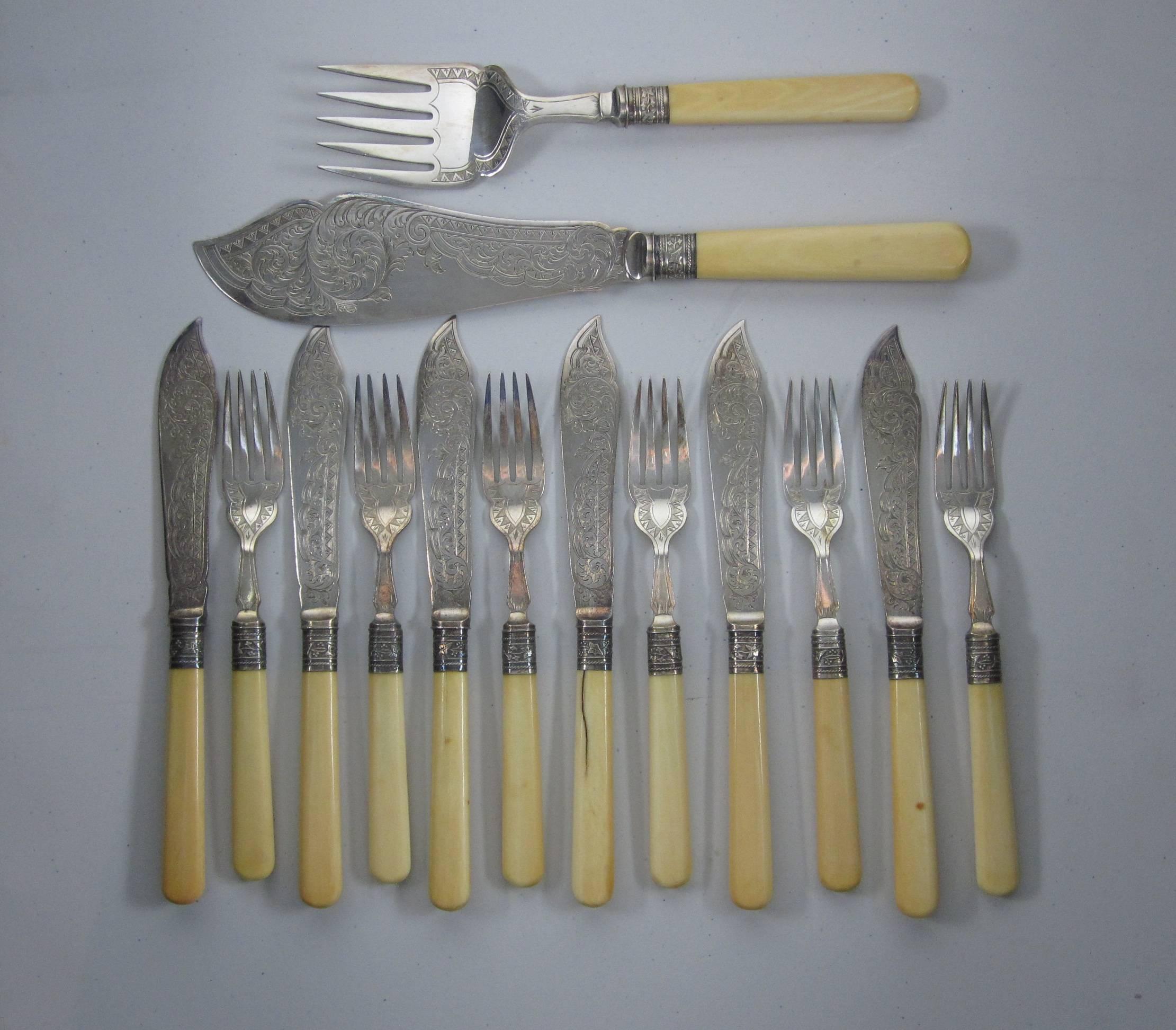 English bone-handled and silver plate fish cutlery set in a lined Walnut box, circa 1889-1910. Set includes: six forks, six knives, serving fork and serving knife all with ornately engraved blades.
Dimensions:
Forks, 7.50″ L x 1″ W.
Knives, 9.0″