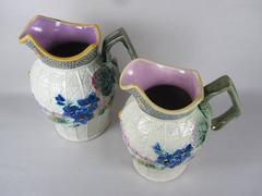 Pair of English Majolica Violets and Butterflies Pitchers