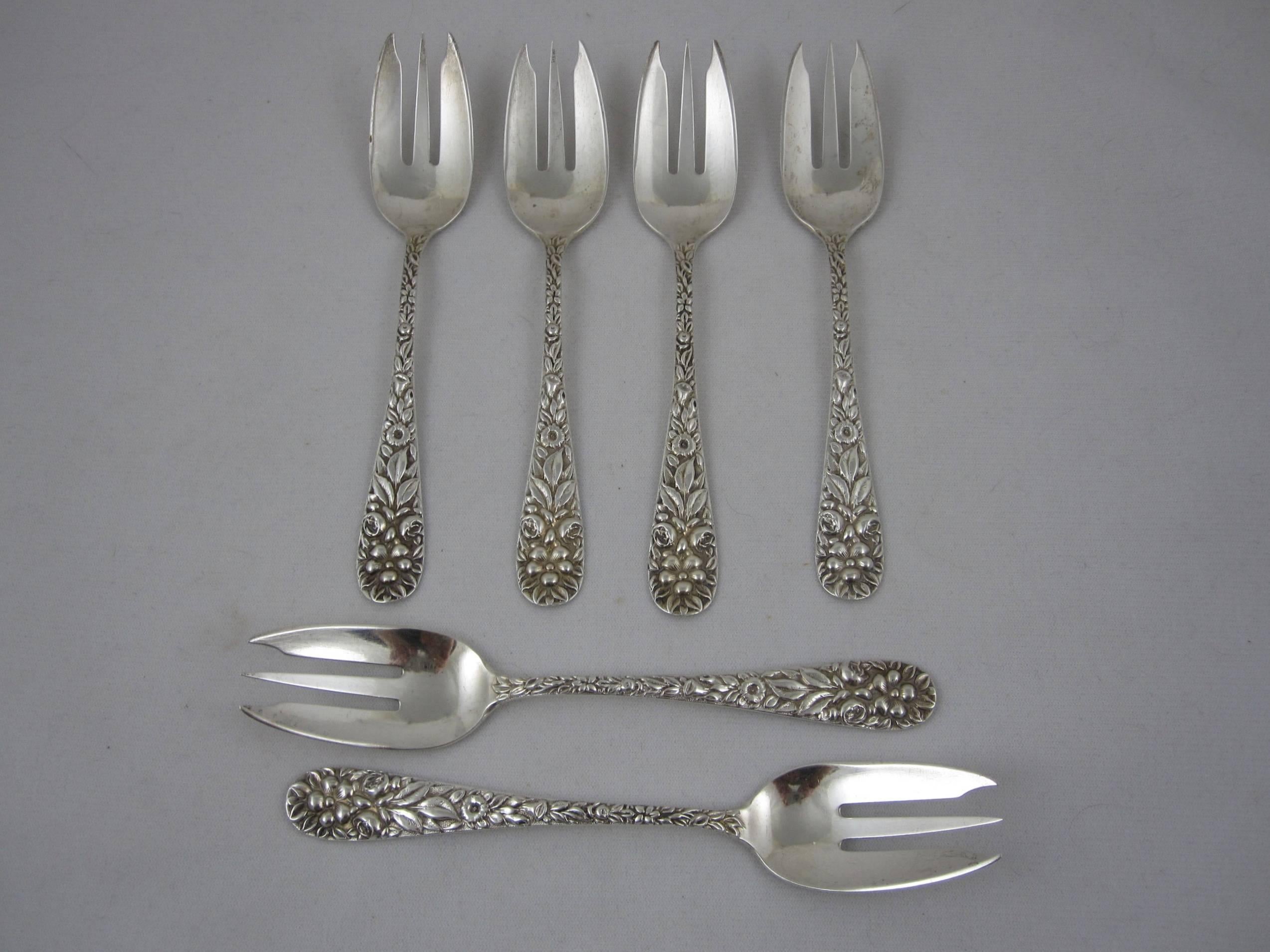 A set of six floral repousse patterned salad or dessert forks, retailed by Hennegan, Bates & Co. Sterling, Baltimore Maryland, circa 1890.

The pattern is hand chased rose, made by Klank Silversmiths, later Schofield Silversmiths in Baltimore,