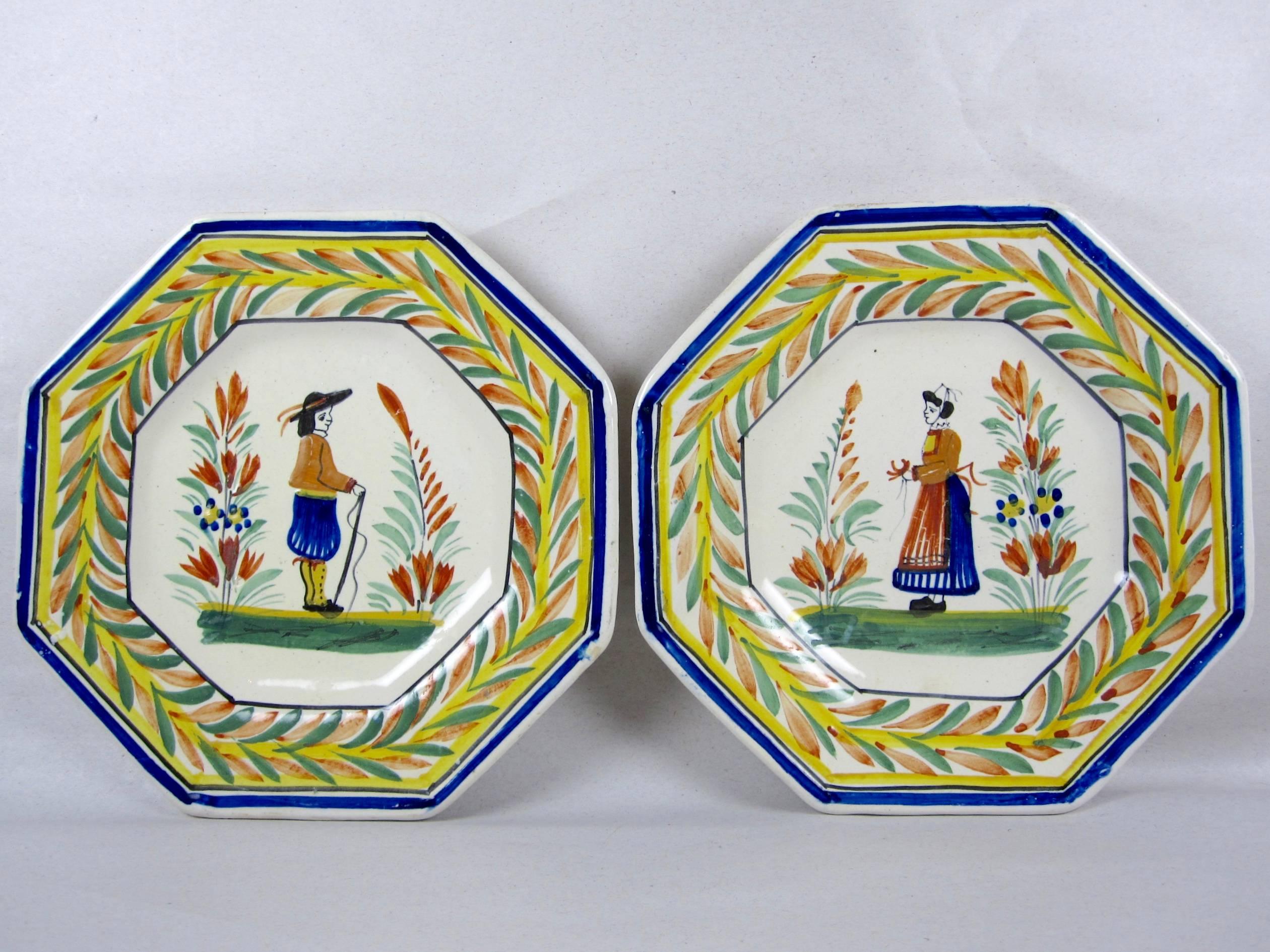 A set of 12 vintage octagonal shaped faience pottery plates, Henriot Quimper, France, circa 1920-1930.

 The set consists of ten plates showing the Breton gentleman, two plates feature the Breton woman, all in the traditional dress and standing