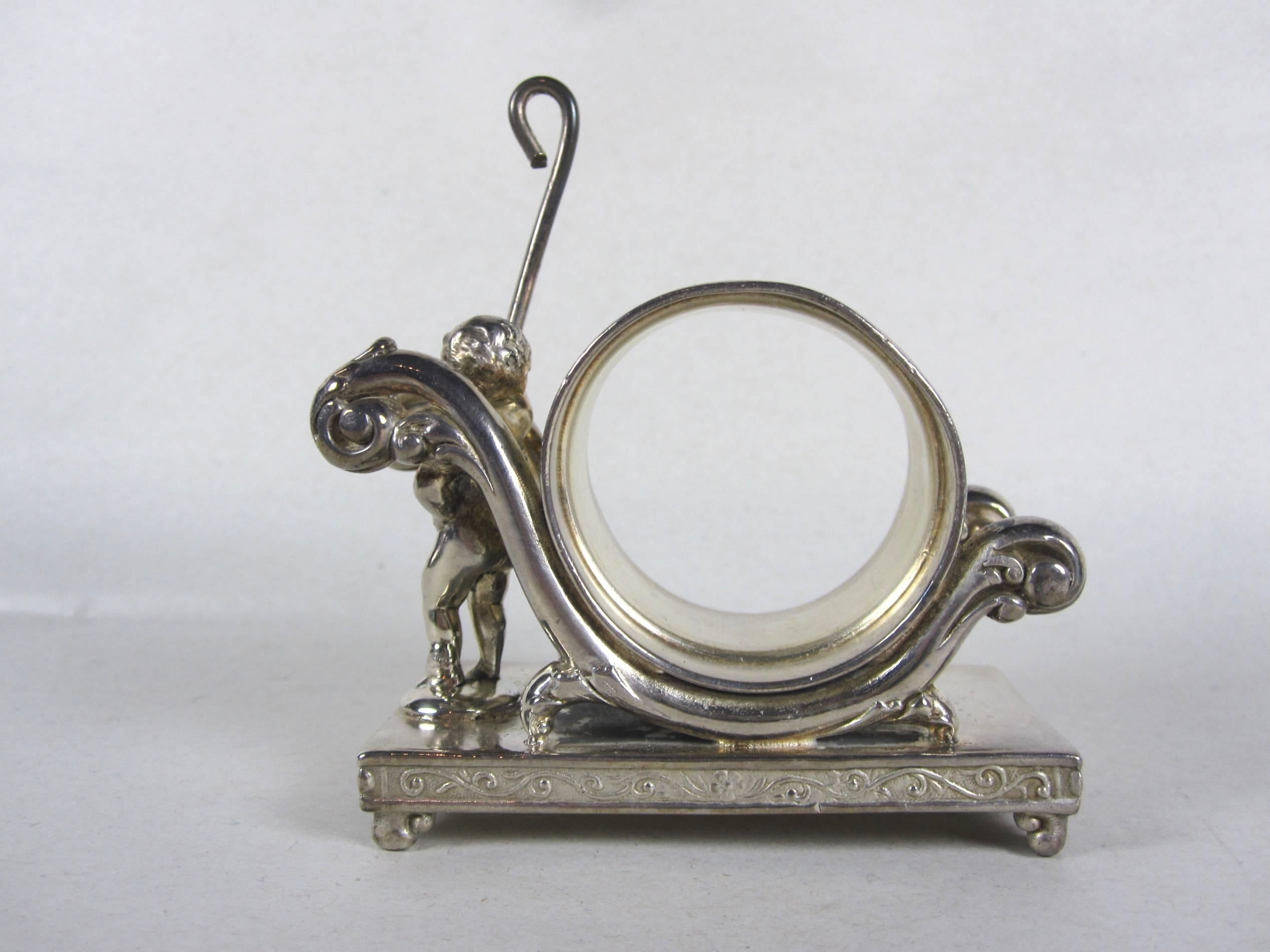 Cast Antique Victorian Silver Plate Marching Putto Standing Napkin Ring Place Holder