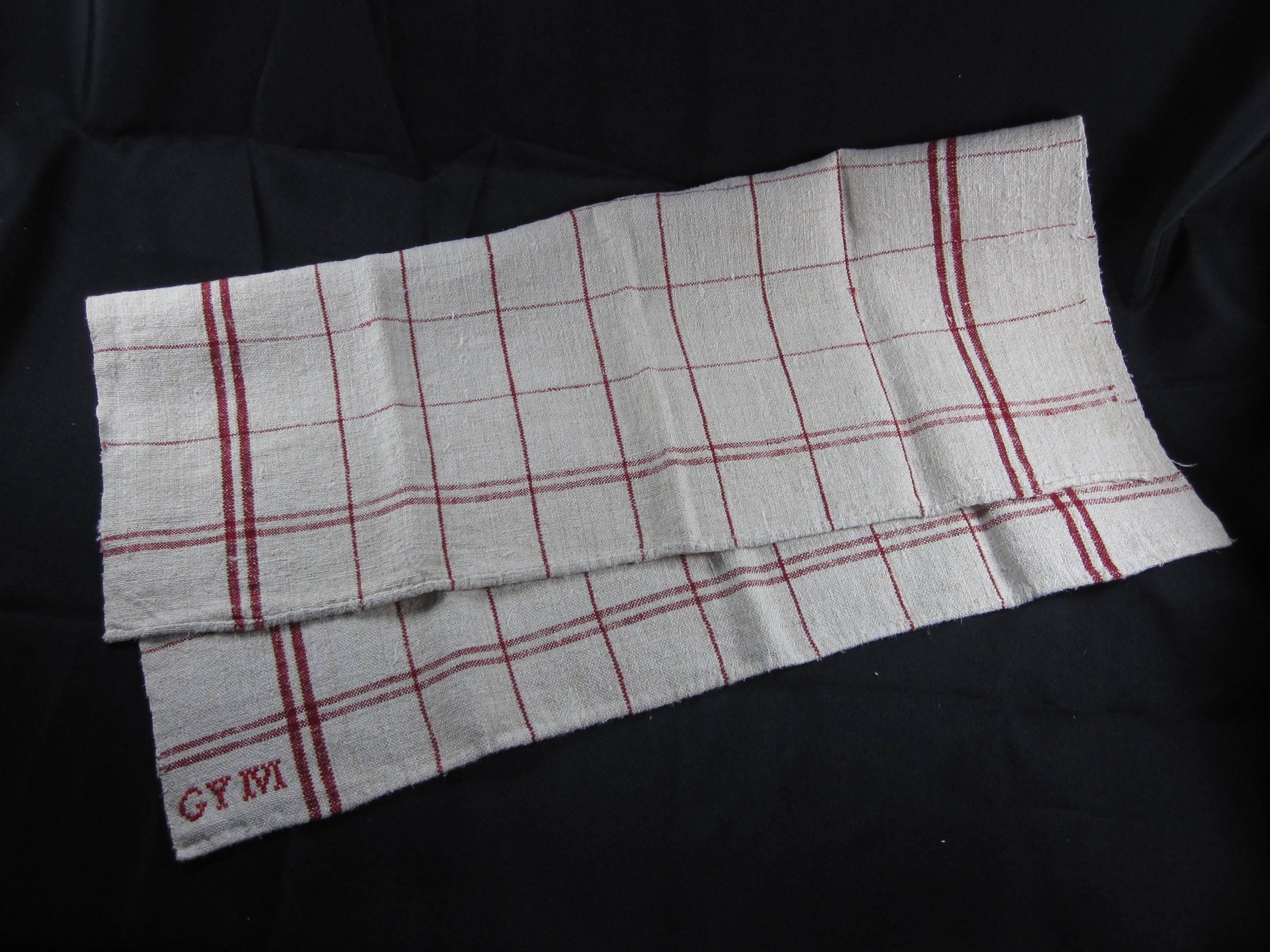 Found in a Provençal Brocante in France, a set of six rustic, vintage, hand-spun kitchen torchons or towels with red stripes on natural linen and embroidered with the initials, GYM. Hand stitched hems, freshly laundered and starched. 

Wonderful