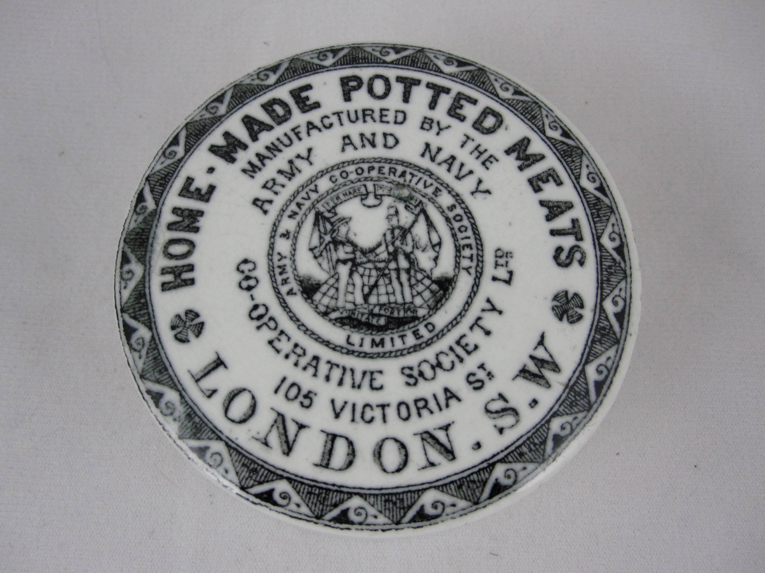 A transfer printed covered ceramic earthenware container from the Victorian Era, Staffordshire, England, circa 1900. 

The pot contained ground meat potted from the stores of the Army and Navy Co-op Society of 105 Victoria Street, London – now