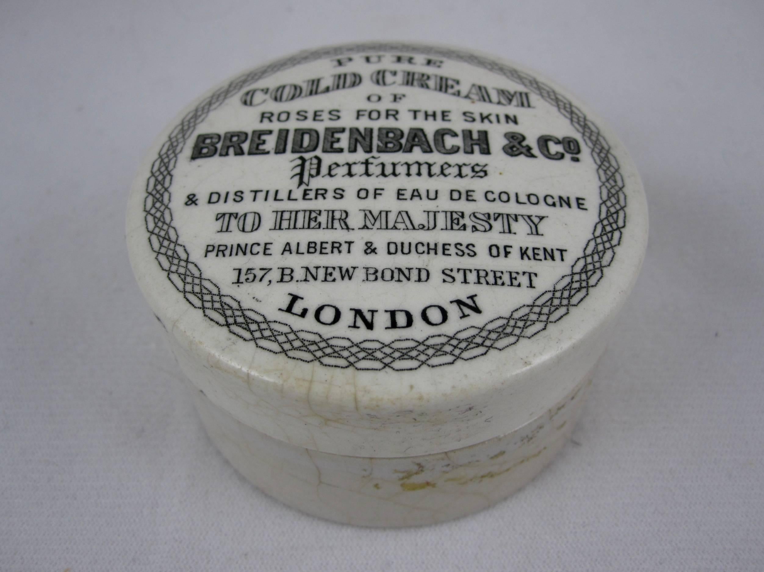 A transfer printed covered ceramic earthenware container from the Victorian Era, Staffordshire, England, circa 1880-1885. The pot contained a chemists mixture of cold cream, often one part wax and four parts rose oil.

This pot reads: “Breidenbach