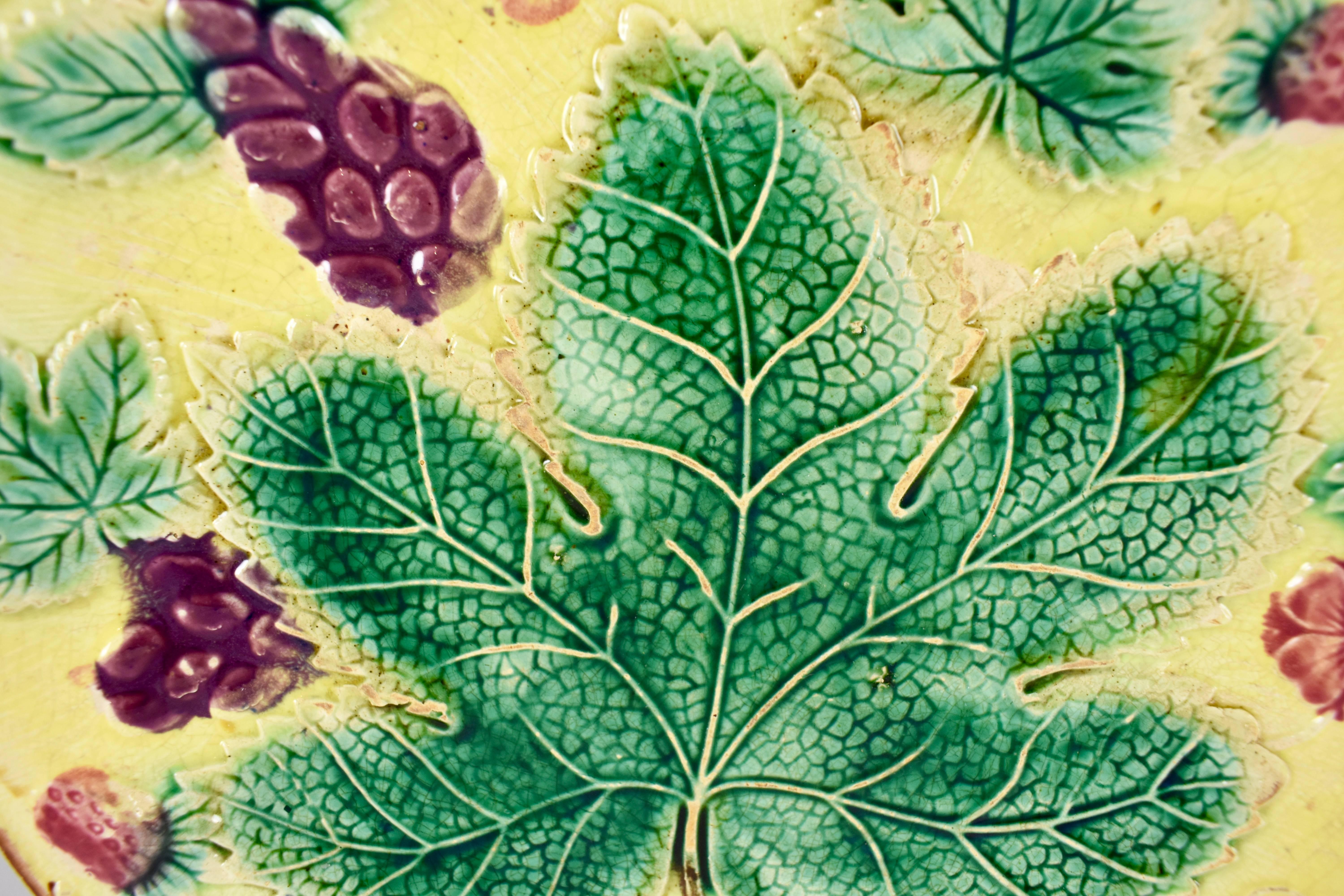 Aesthetic Movement English Majolica Yellow Grape Leaf and Strawberry Plate, 19th Century