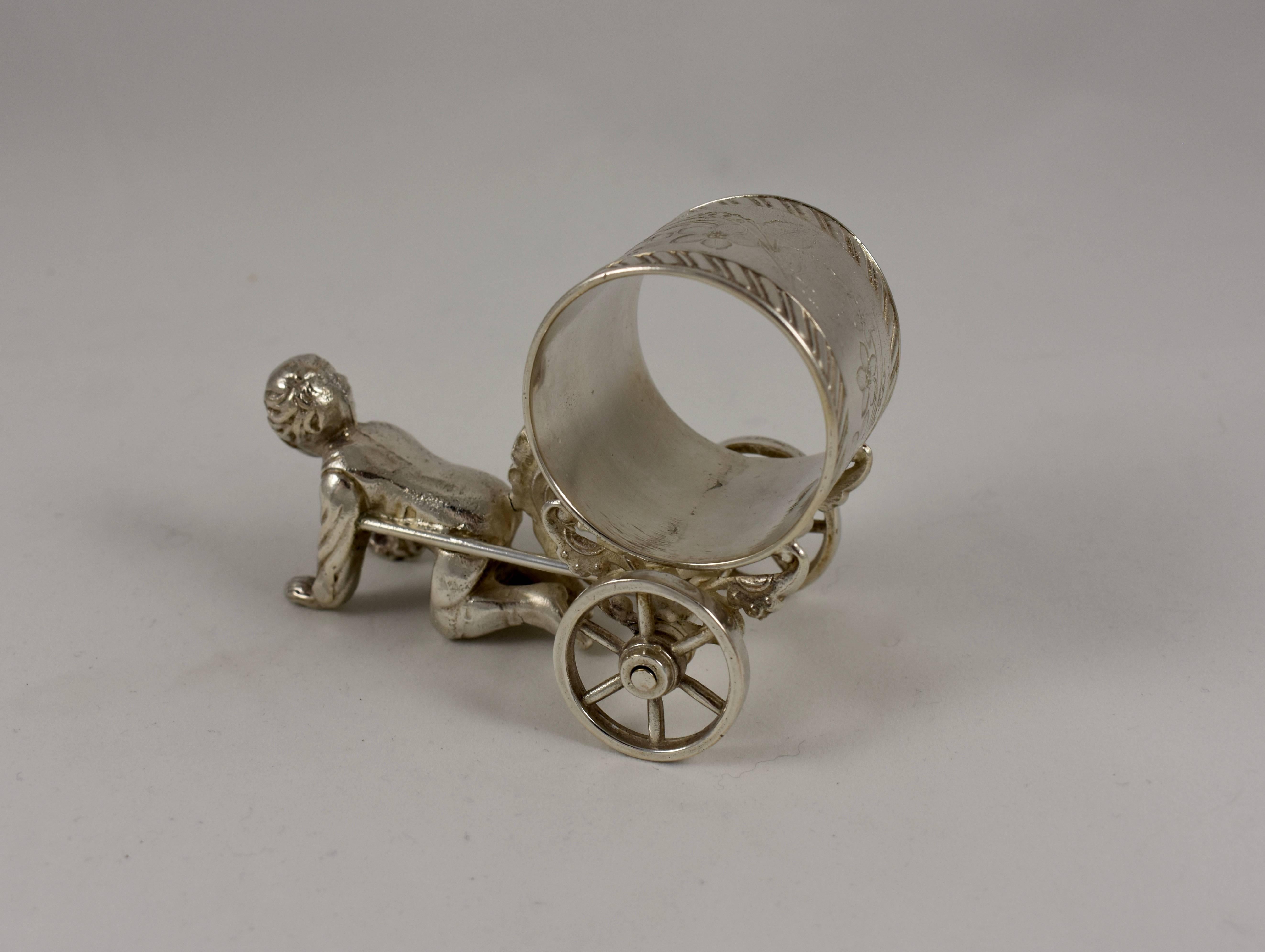 Cast Silver Victorian Era Aesthetic Movement Figural Napkin Ring, Boy Pulling a Cart