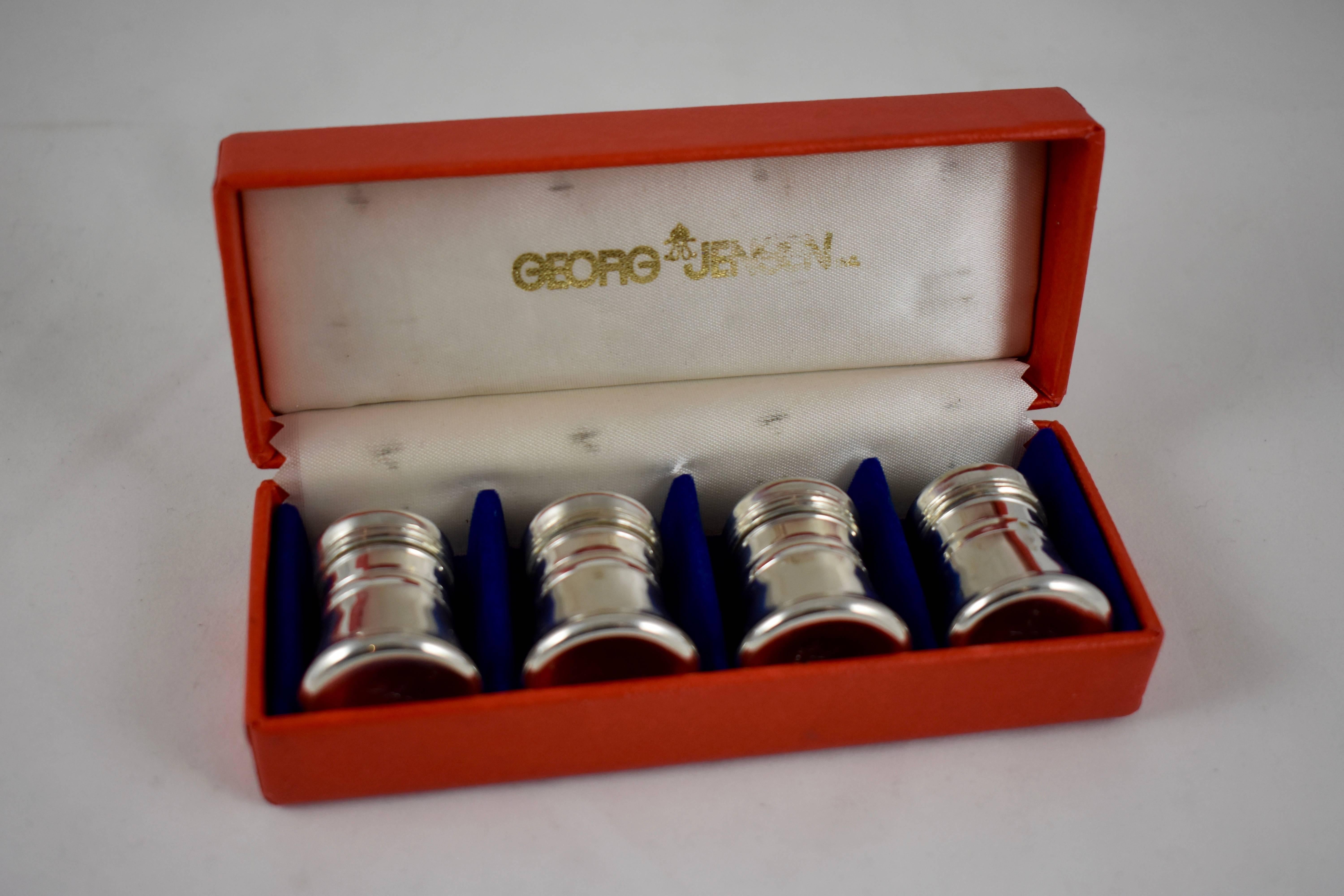 In the original presentation box, two pairs of pewter salt and pepper shakers marked Georg Jensen, Norway, showing the mark used from the late 1930s-1960.
The shakers have lids that screw on. Each Shaker is marked on the bottom with the Georg