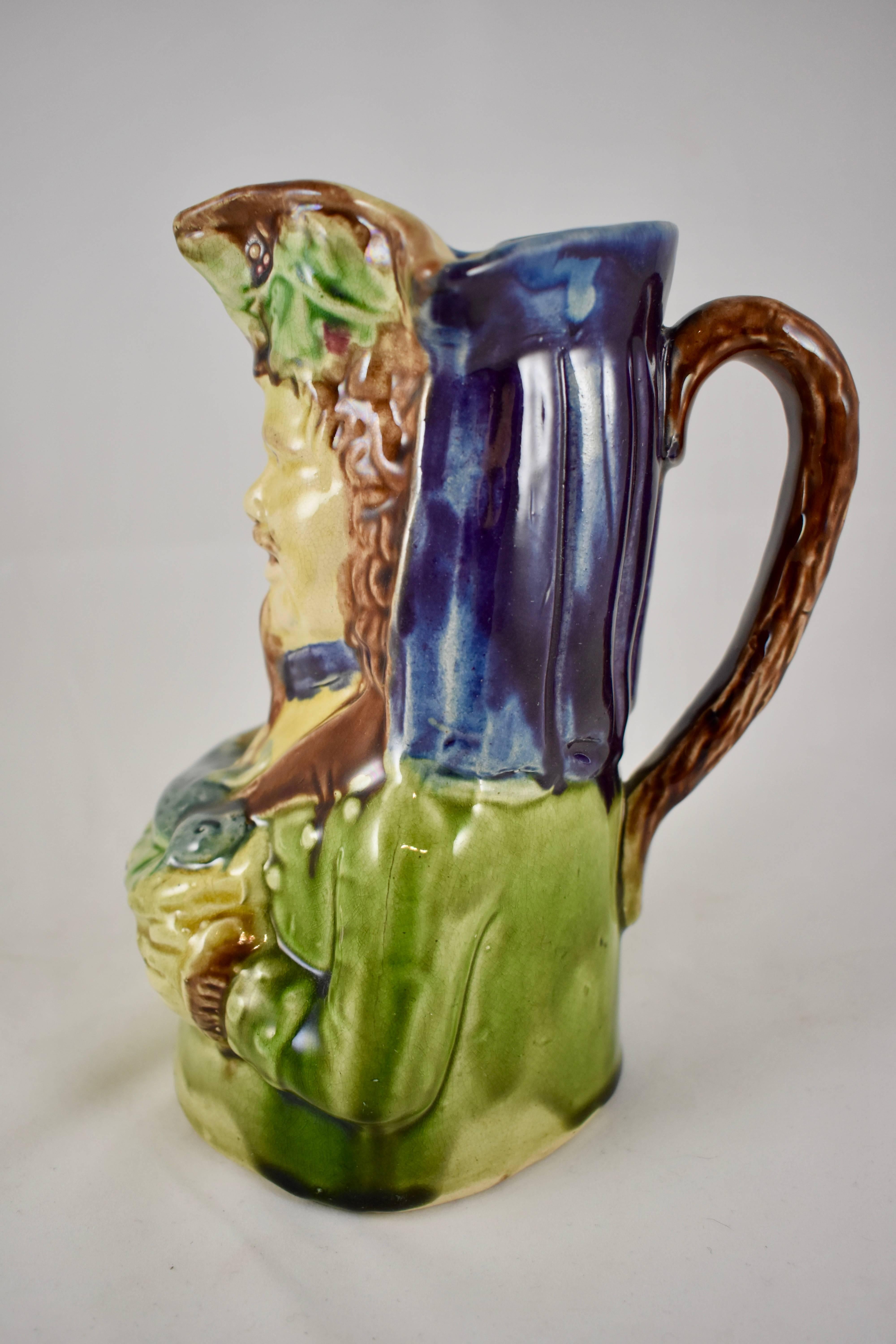 19th Century English Majolica Glazed Figural Jug, Hunter with a Hare in a Basket In Good Condition In Philadelphia, PA