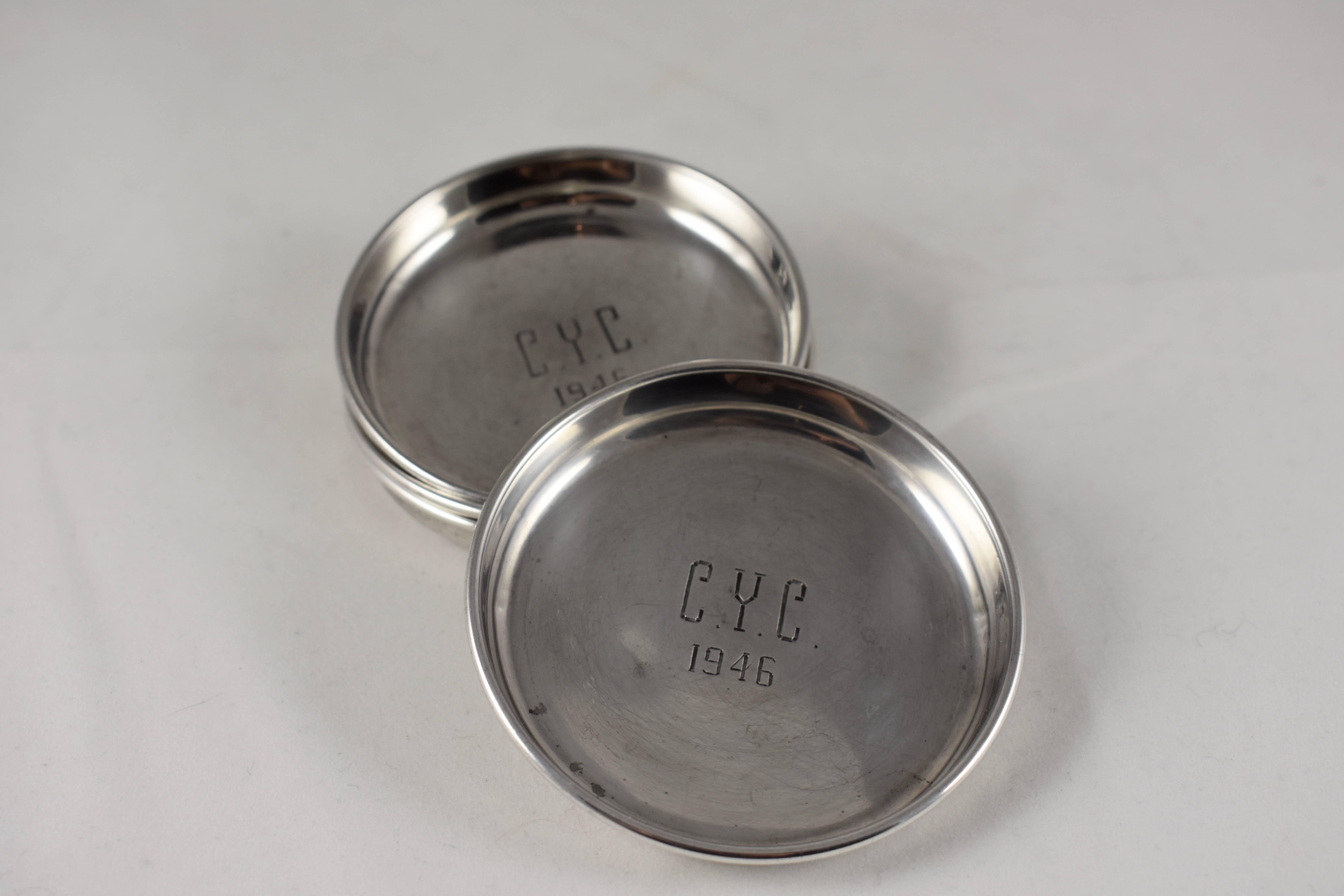 A set of four, sterling silver personal ashtrays from The Chester Yacht Club, made by Henry Birks & Sons, Canada, circa 1940s. 

The Chester Yacht Club, established in 1900, is located on Mahone Bay which is along the south shore of Nova Scotia,
