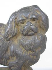 19th Century John Hubley Cast Iron Pekinese Dog Bookends / Door Stops, a Pair