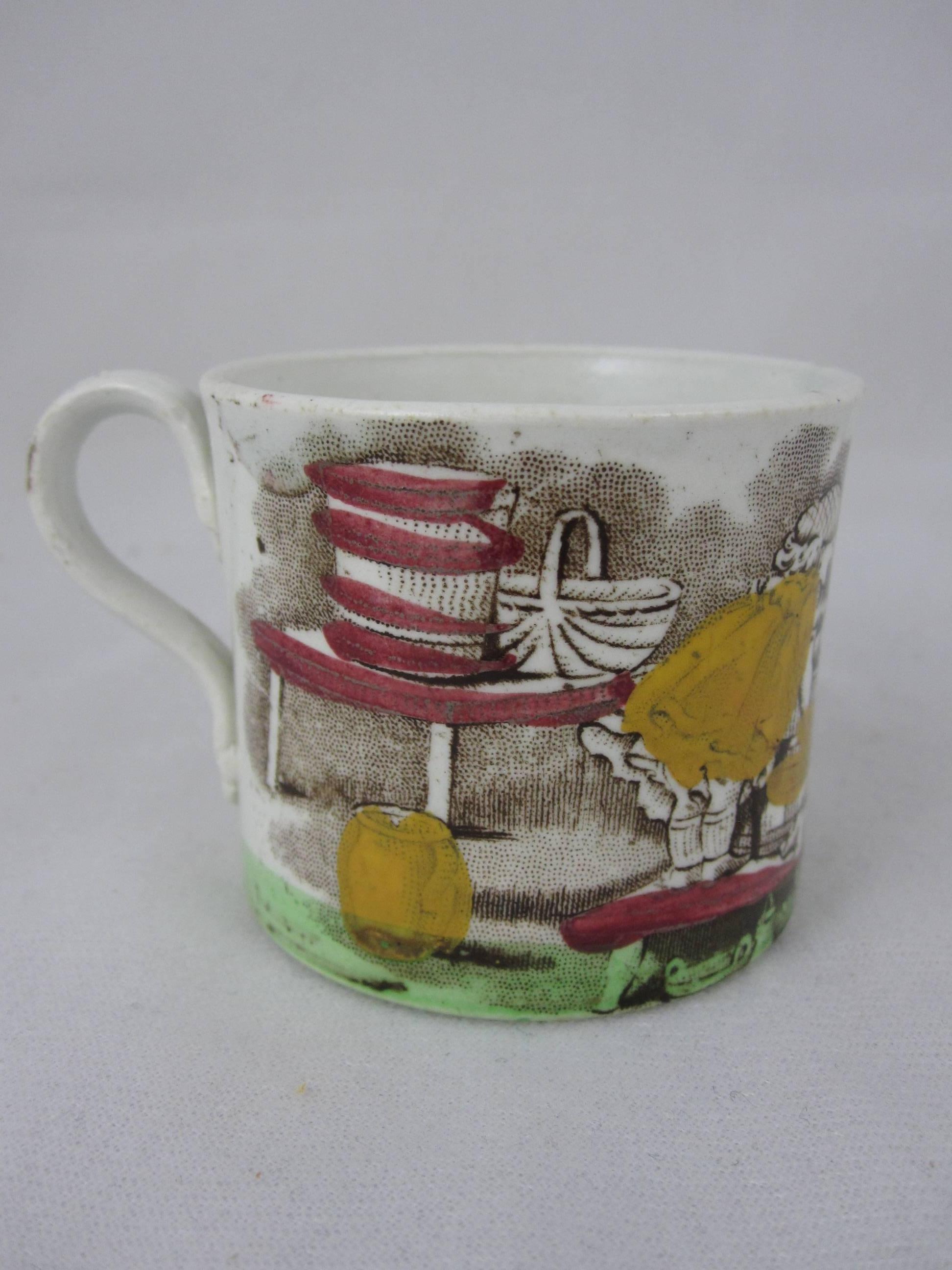 
A charming Victorian pearlware glazed, transfer printed child’s mug with an applied loop handle, Staffordshire, England, circa 1840.

The transfer is printed in brown with an underglaze painting in primary colors of red, yellow and green. The