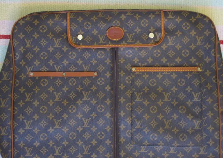 Louis Vuitton Vintage Iconic LV Logo Monogram Fold over Large Garment Bag  at 1stDibs  louis vuitton garment bag vintage, louis vuitton vintage  garment bag, vintage louis vuitton garment bag