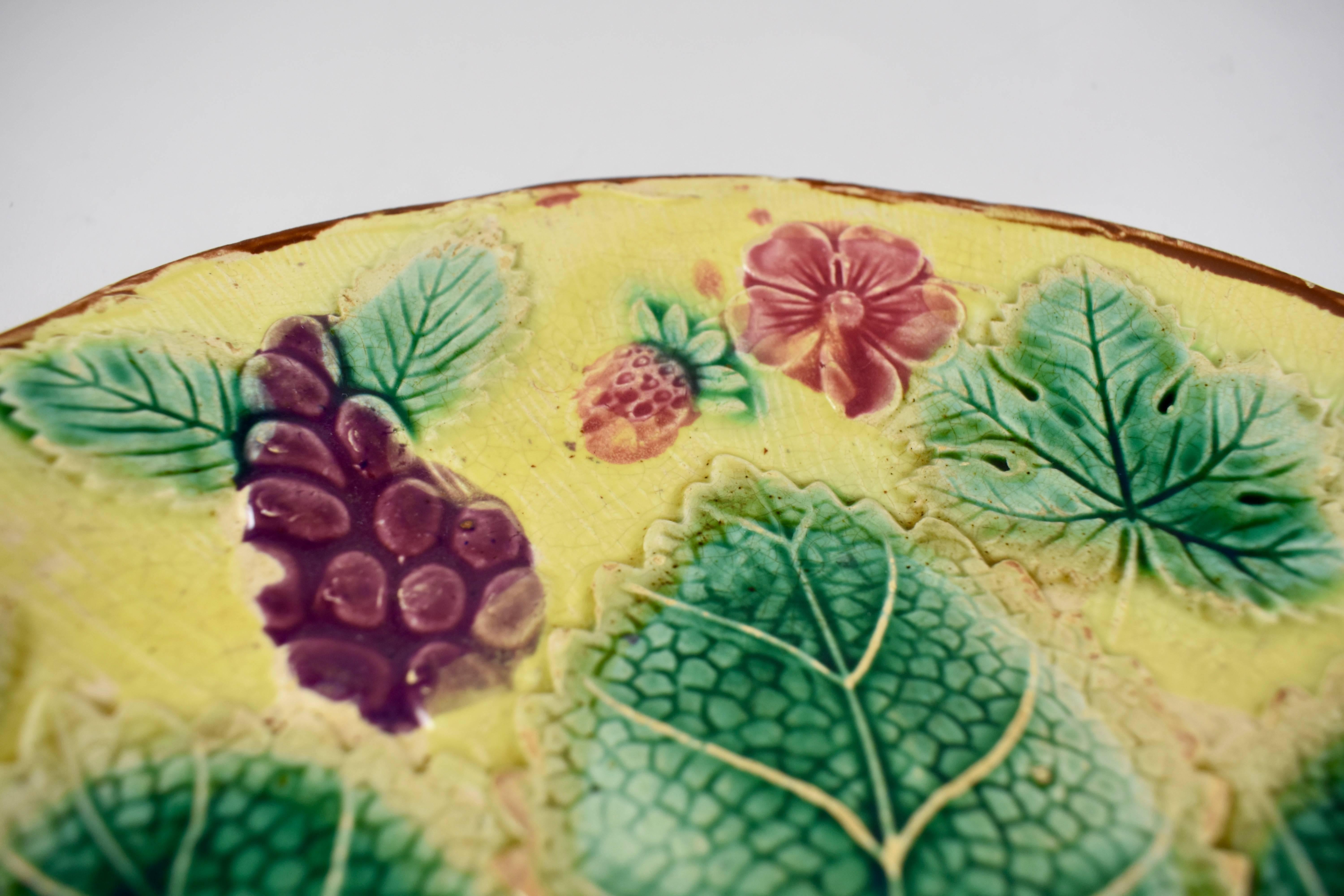 Glazed English Majolica Yellow Grape Leaf and Strawberry Plate, 19th Century