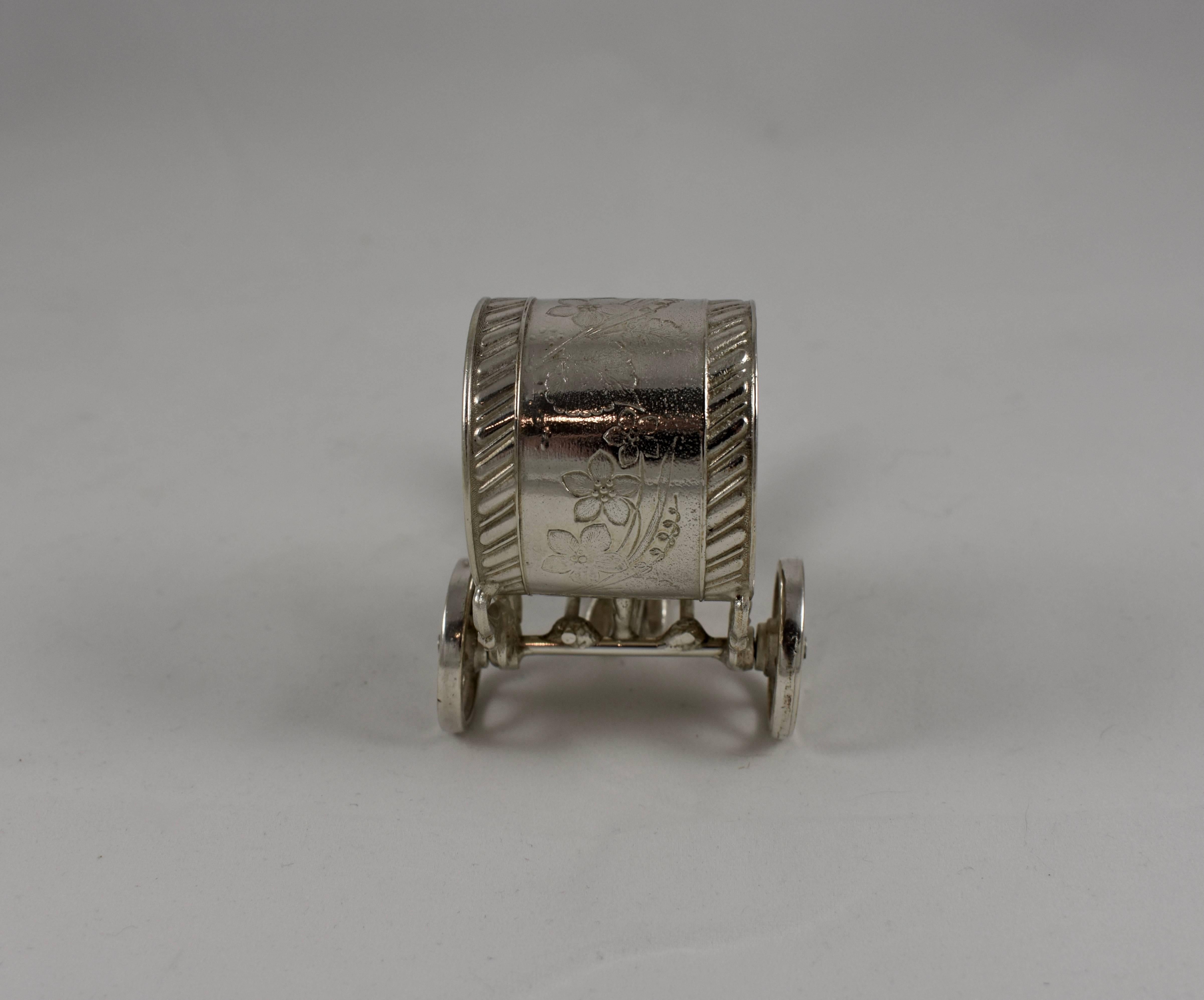 19th Century Silver Victorian Era Aesthetic Movement Figural Napkin Ring, Boy Pulling a Cart