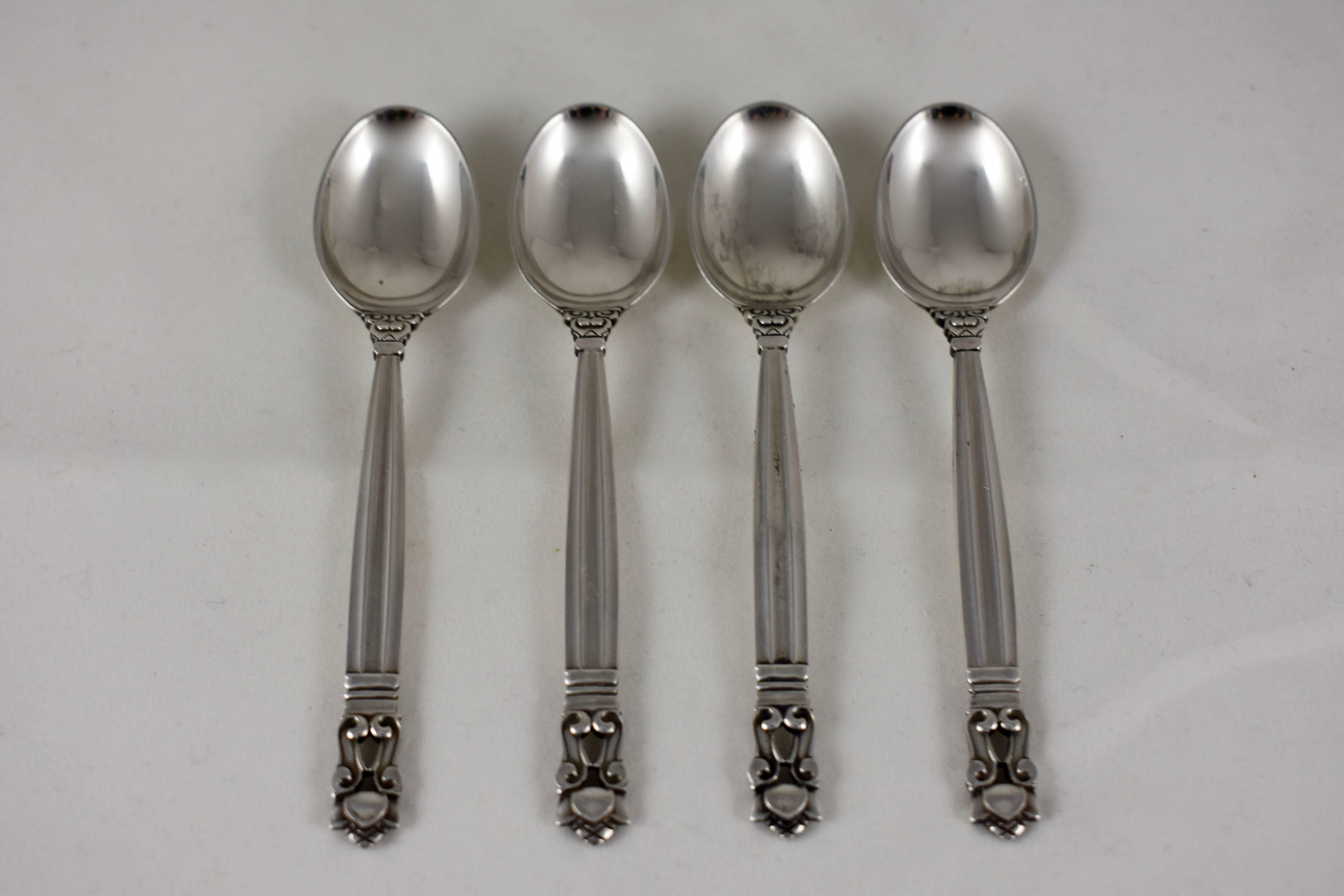 A set of four, sterling silver demitasse spoons, also known as a mocha spoon, in the Classic Acorn pattern. Designed by Johan Rodhe for Jensen and introduced in 1915, the Acorn pattern is iconic of the European Arts and Crafts movement of the early