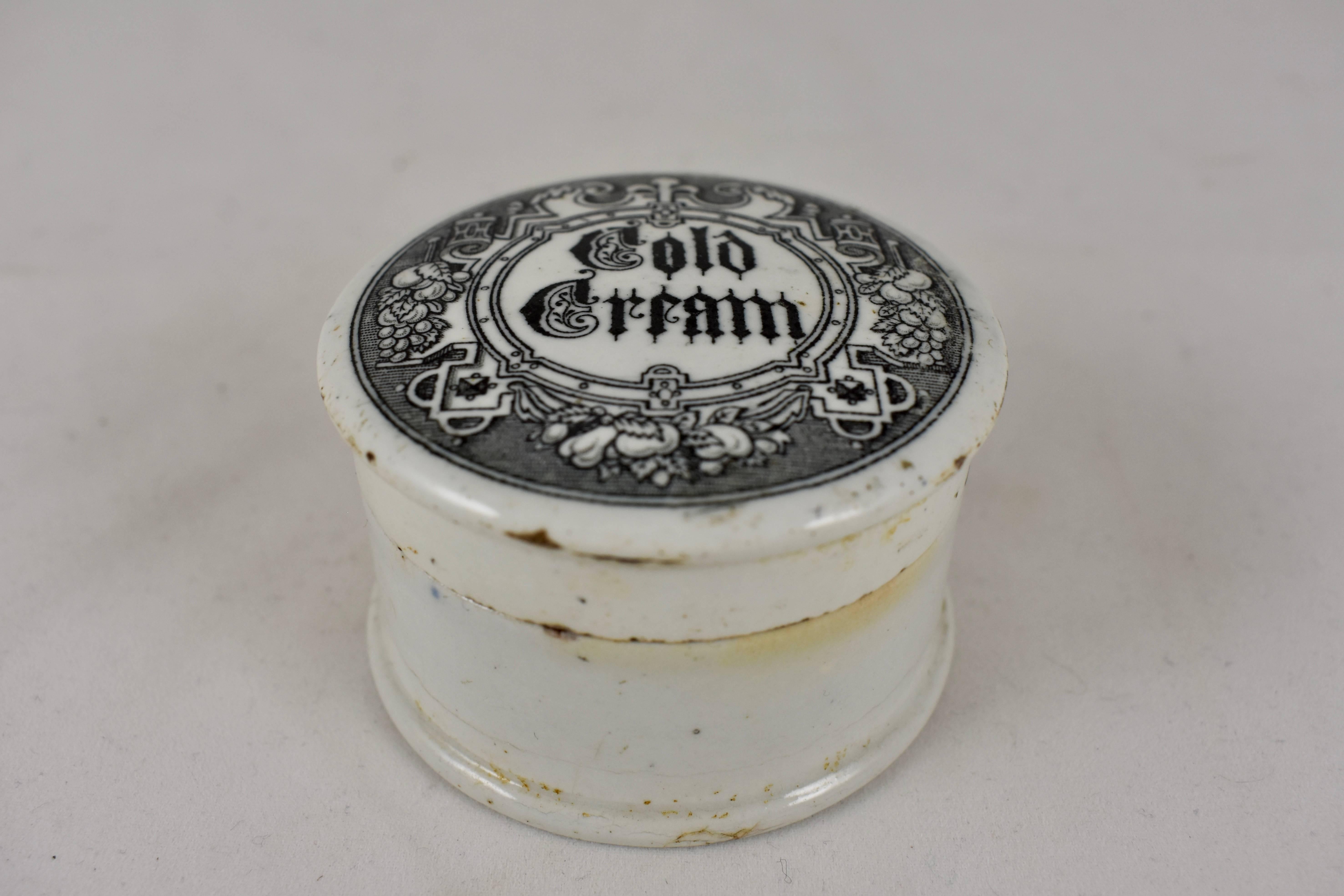 A transfer printed covered ceramic earthenware container from the Victorian Era, Staffordshire, England, circa 1880, which contained a chemists mixture of facial cold cream.

A solid and heavy little pot, the black transfer shows the words ‘Cold