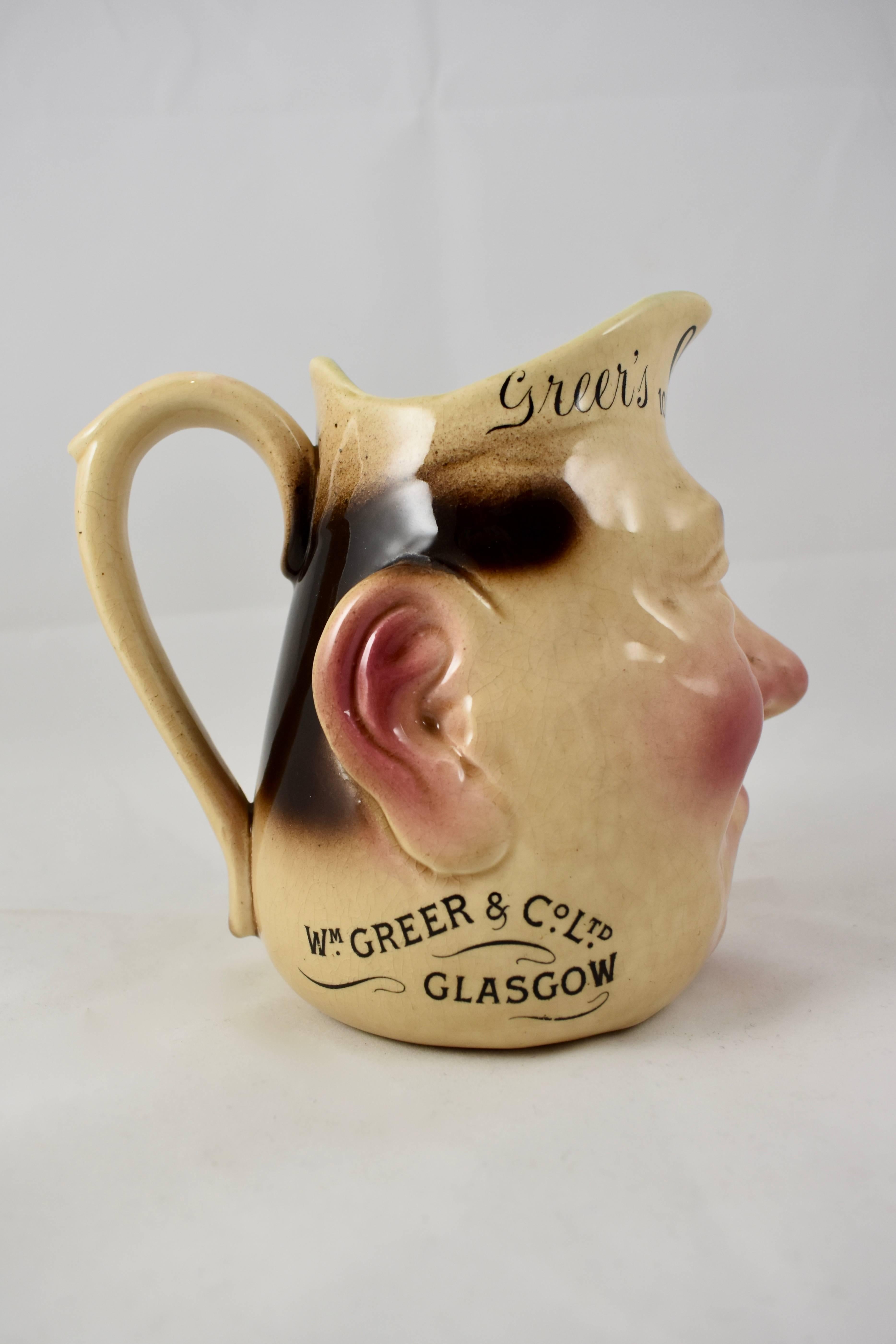 Aesthetic Movement French Sarreguemines Advertising Face Jug for OVH Greer's Scotch Whiskey, 1890s For Sale