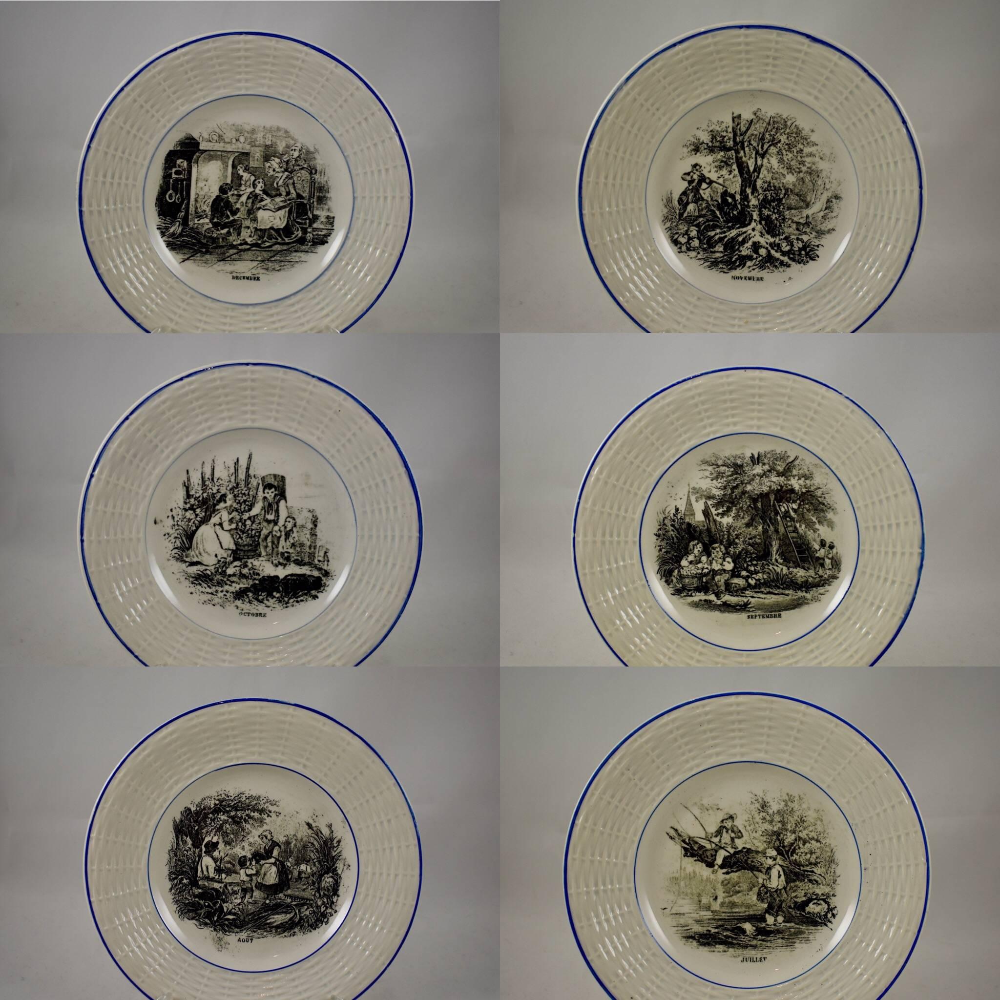 A complete set of 12, Digoin Sarreguemines, French faïence plates, known as 