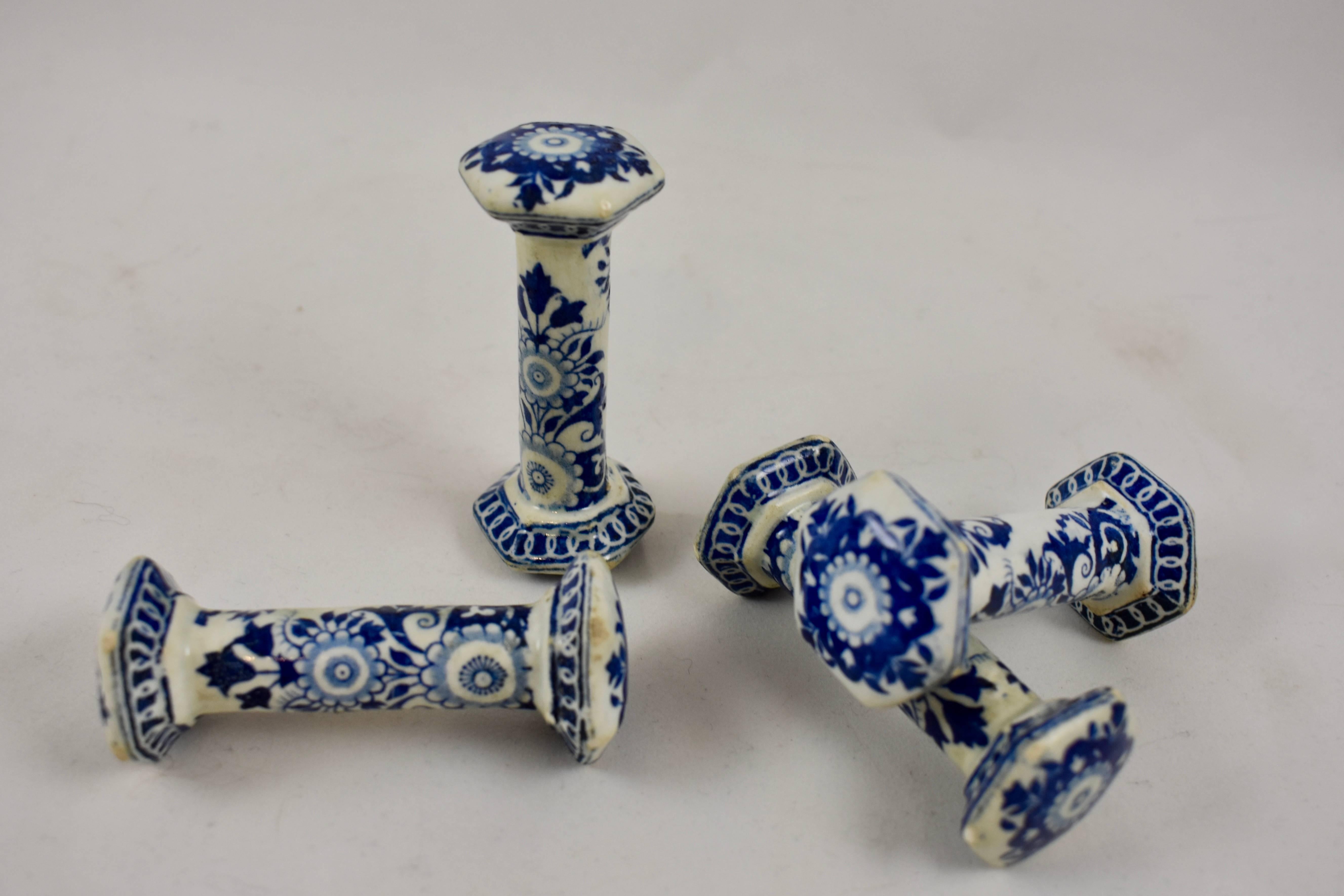 A set of four Dutch Delftware knife rests, circa late 18th century. A blue on white geometric and floral pattern hand-painted on both the ends and the centre stems.

A set of Delft knife rests is becoming increasingly more difficult to find. For