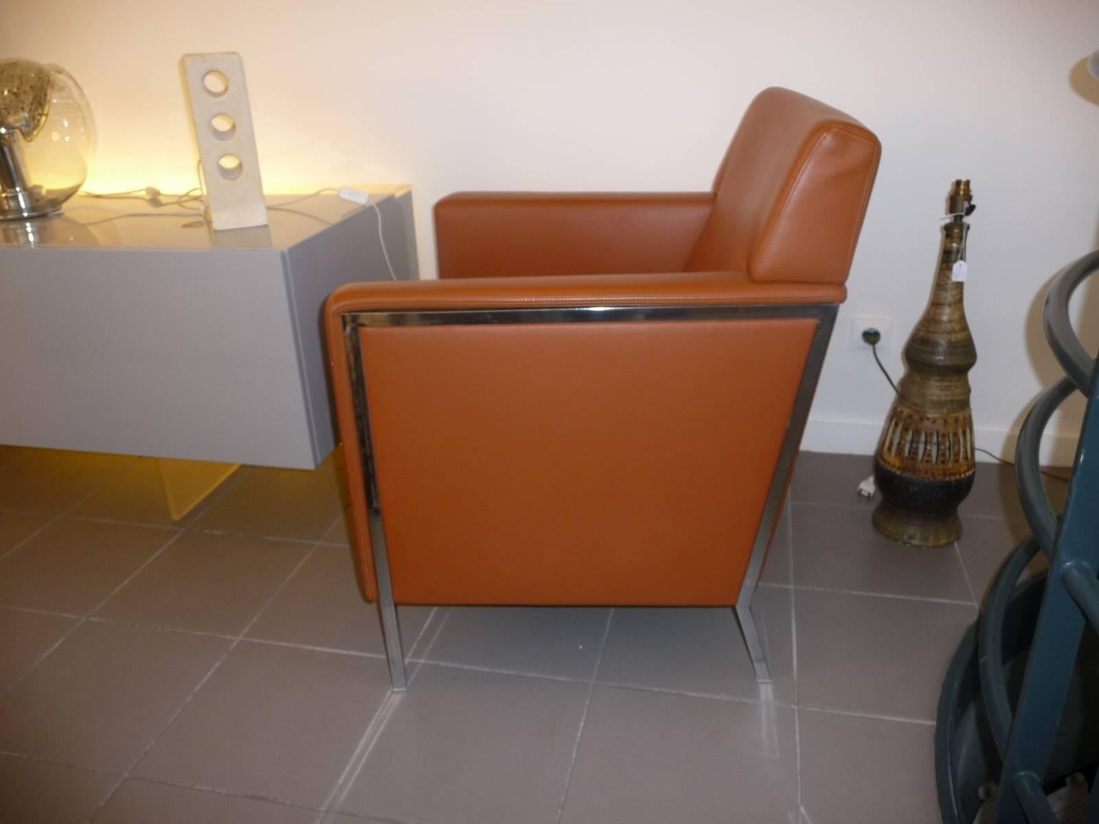 Paire de fauteuils en acier design par Enrico Franzolini pour Moroso en cuir.
Les fauteuils sont en parfait état et très confortables.