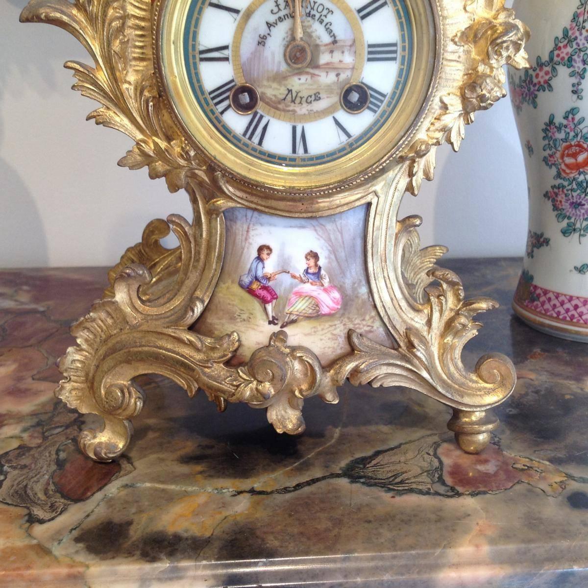 French Pendulum Louis XV Style Gilt Bronze and Porcelain Plates For Sale
