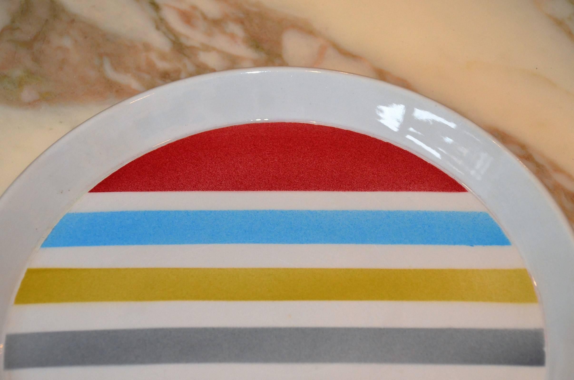 Modernist colorful plate, designed by Gio Ponti for Ceramica Franco Pozzi. The colors create a powerful and dramatic look of energy. It's in perfect conditions and marked on the back.

Free shipping.

Reference: 
Gio Ponti, Fulvio Irace, Page