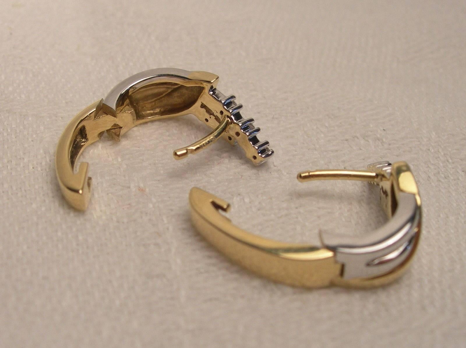 Nice pair of vintage 18-karats yellow and white gold earrings.
Each is decorated with two rows of five small diamonds (1.3 mm).
On the back an hinge clips onto the rod passing though the ear.
Jewelry is in very good conditions.

Total diamond