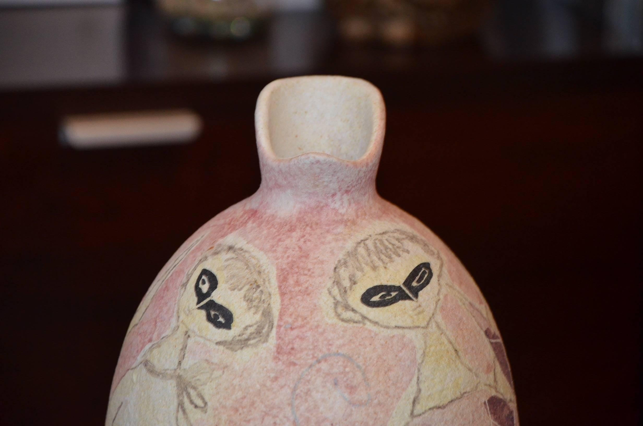 Amazing Mid-Century Modern Marcello Fantoni pottery vase with stylized figures.
Vase measures 30.5cm (12