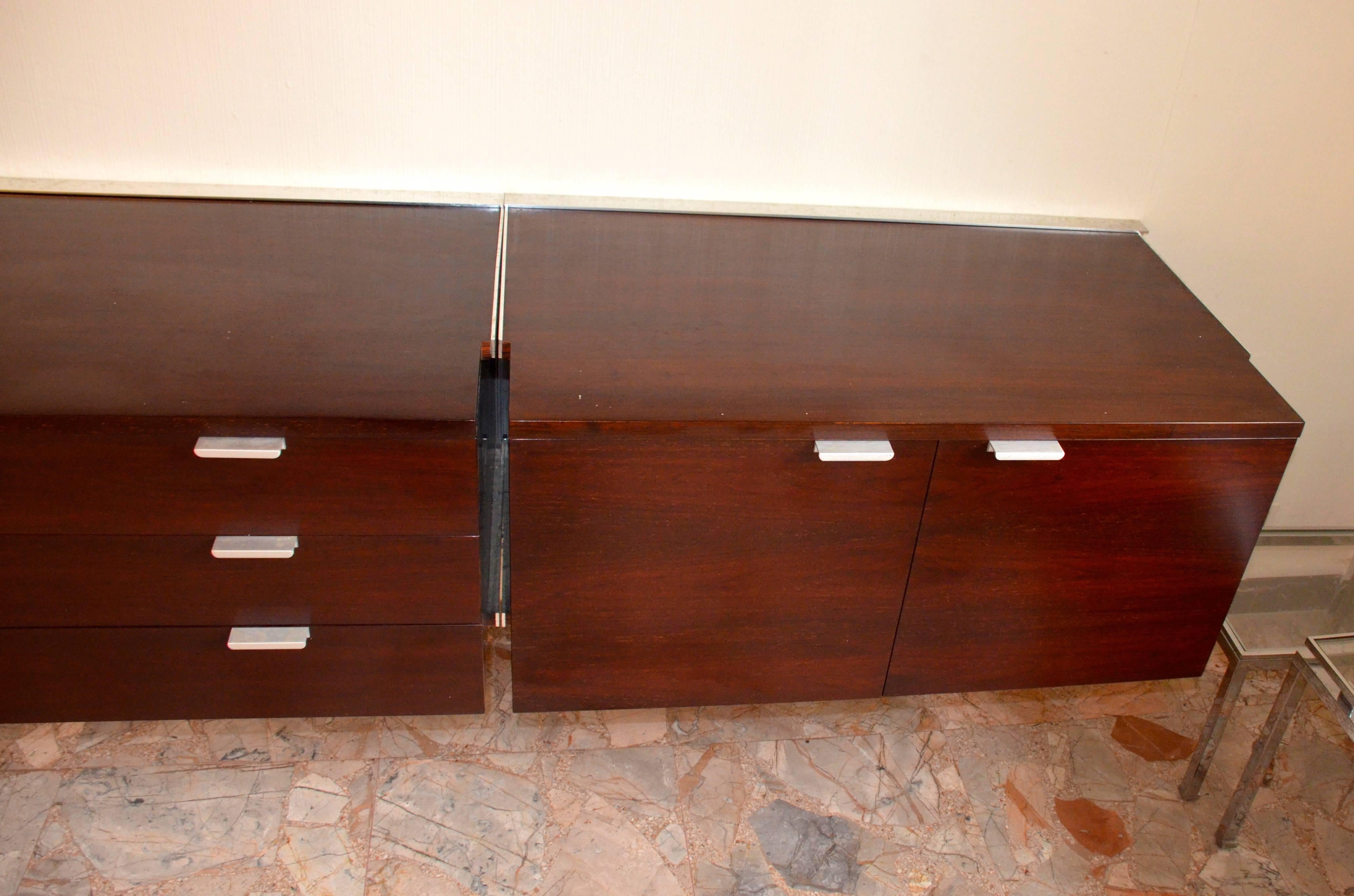 Wall-mounted walnut CSS sideboard by George Nelson for Herman Miller.

  