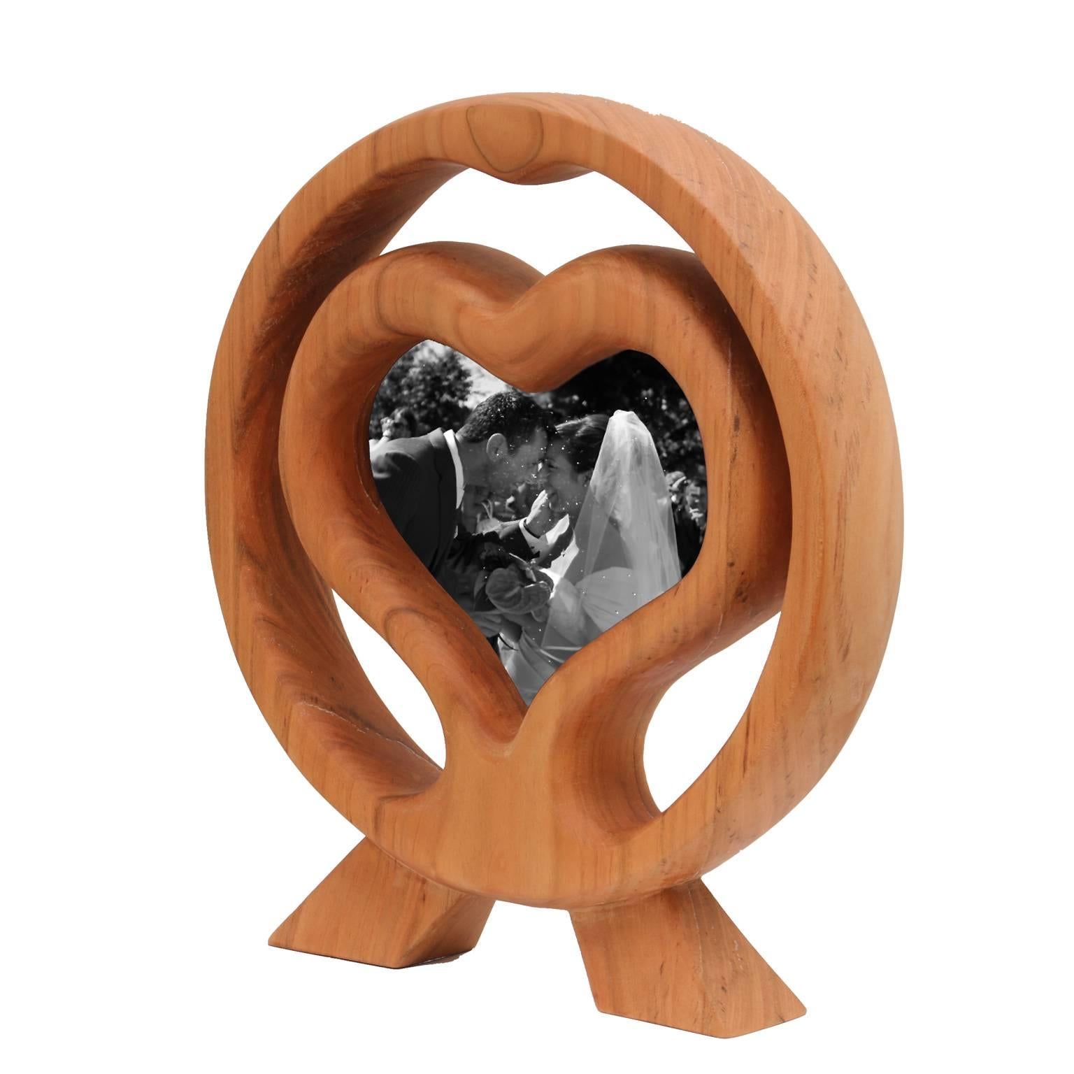 Wood Heart is one of a kind large photo frame for holding most lovely photo of your memories,
A special model of the collection of Laura G Art with Heart photo frames ,  where front and back are beautiful as well. 
It is special because it is like a