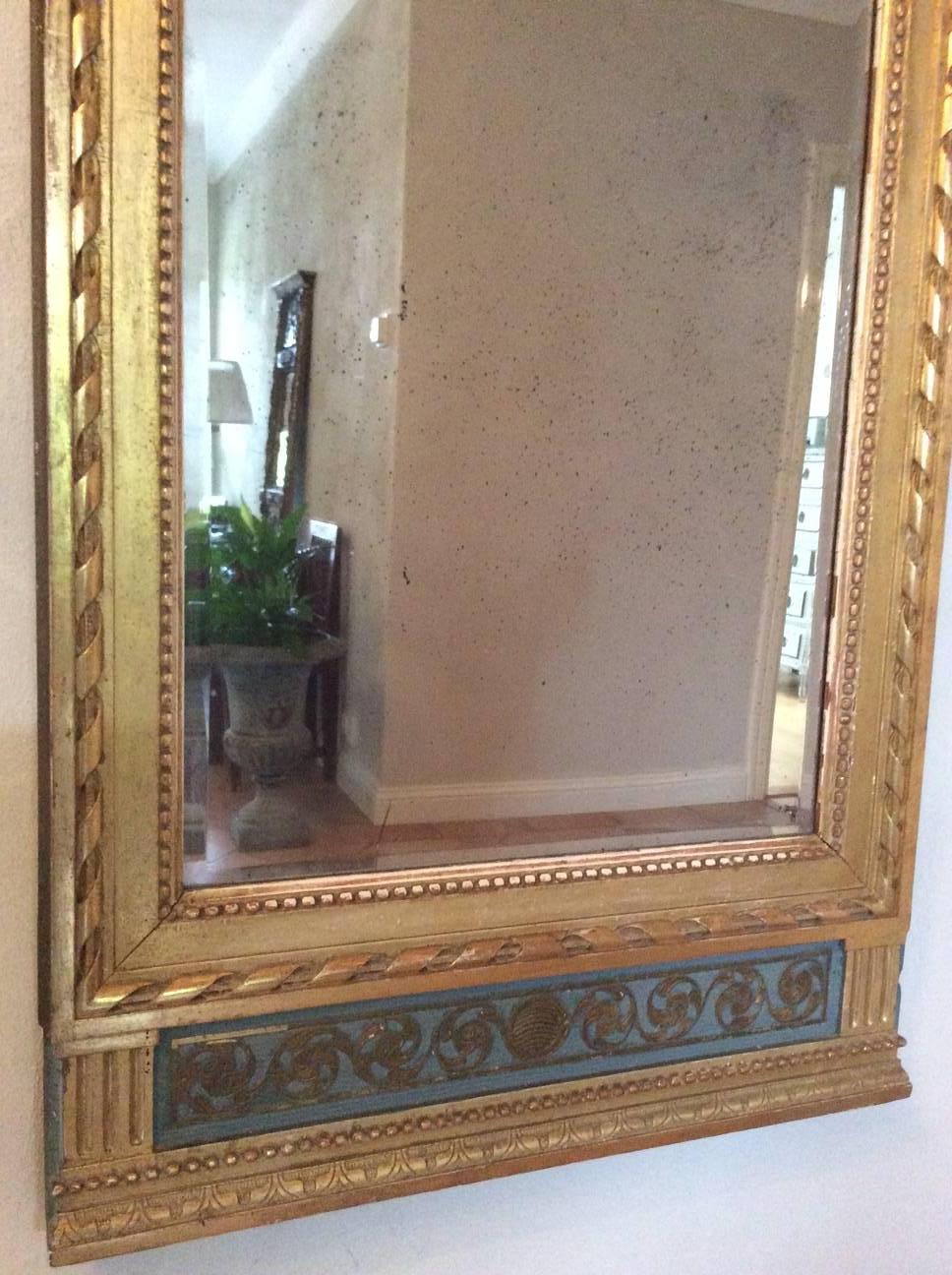 18th century Swedish Gustavian giltwood mirror. Large and in fantastic condition. Signed by master Olof Wetterberg (1784-1803). Original mirror glass and gilt. In the top crown prince Gustav Adolf cipher, GA. He was crowned king in year 1800 as