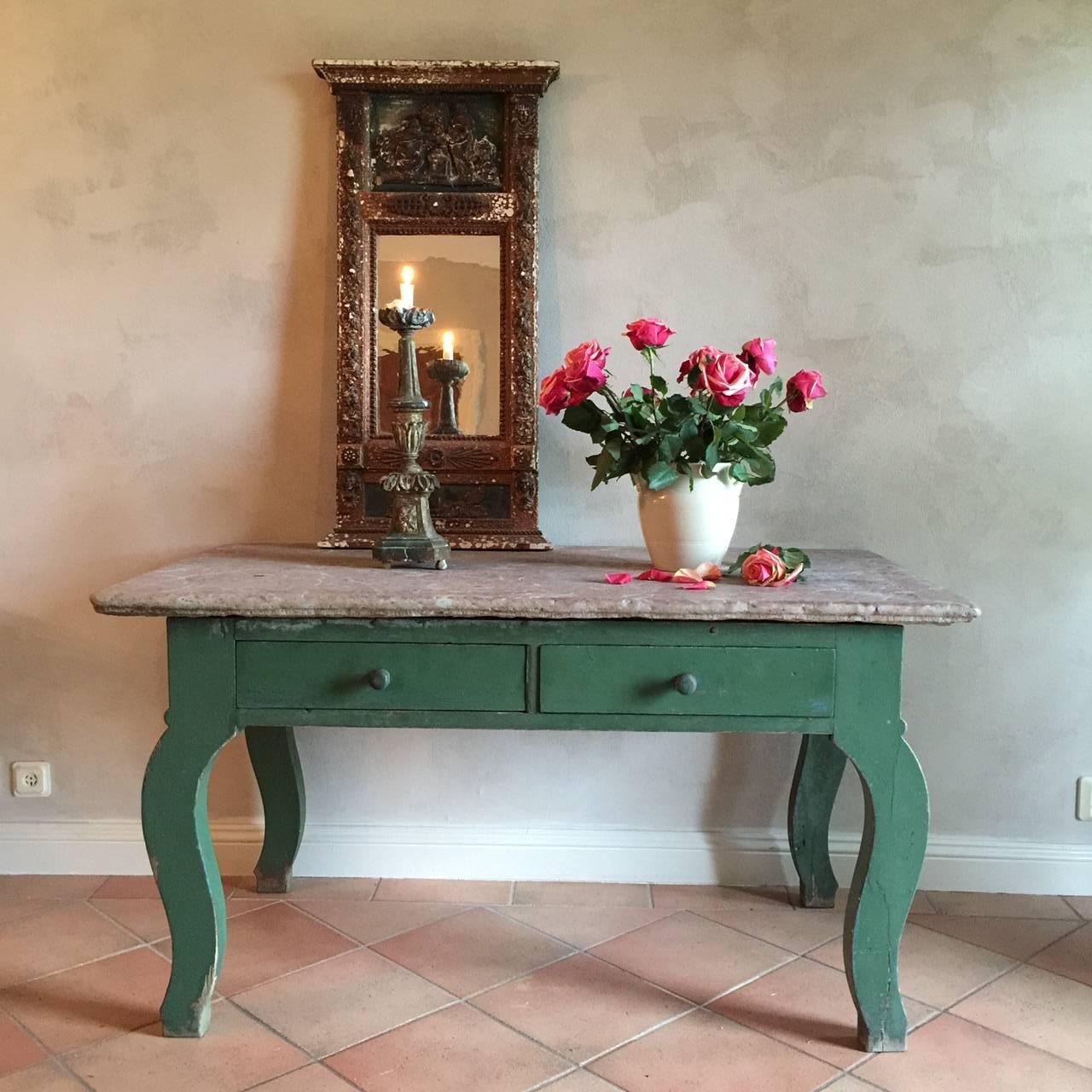 19th century Swedish table with limestone top, green painting, 8 cm thick contoured limestone top, from the Island of Gotland, two drawers, Rococo legs. Fantastic quality and extremely rare table. The limestone top weighs around 200 kg. 