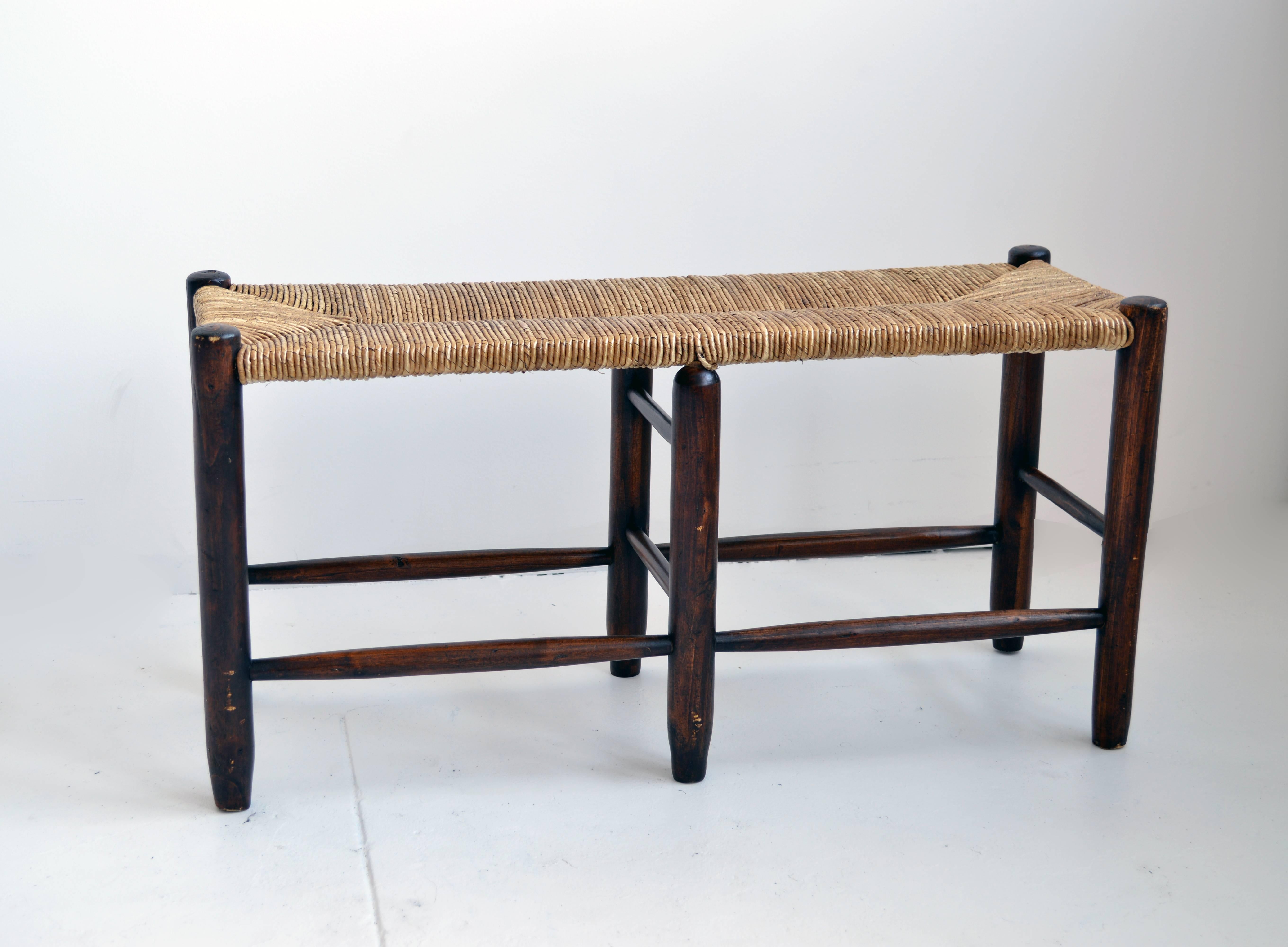 wooden bench with rush seat