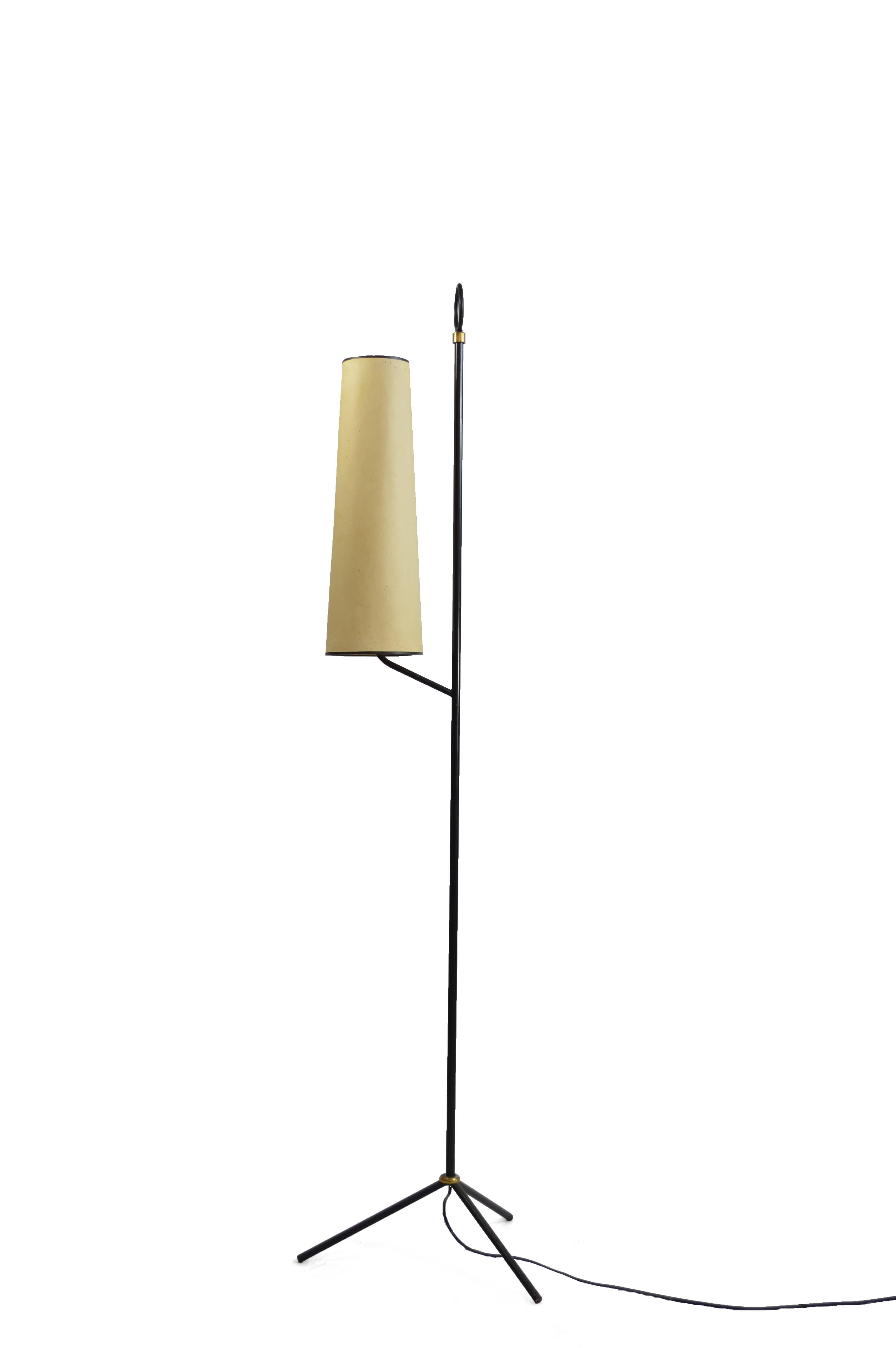 Floor lamp, designed by French post-war designer Jean Royère, with wrought iron tripod base and parchment shade.
 