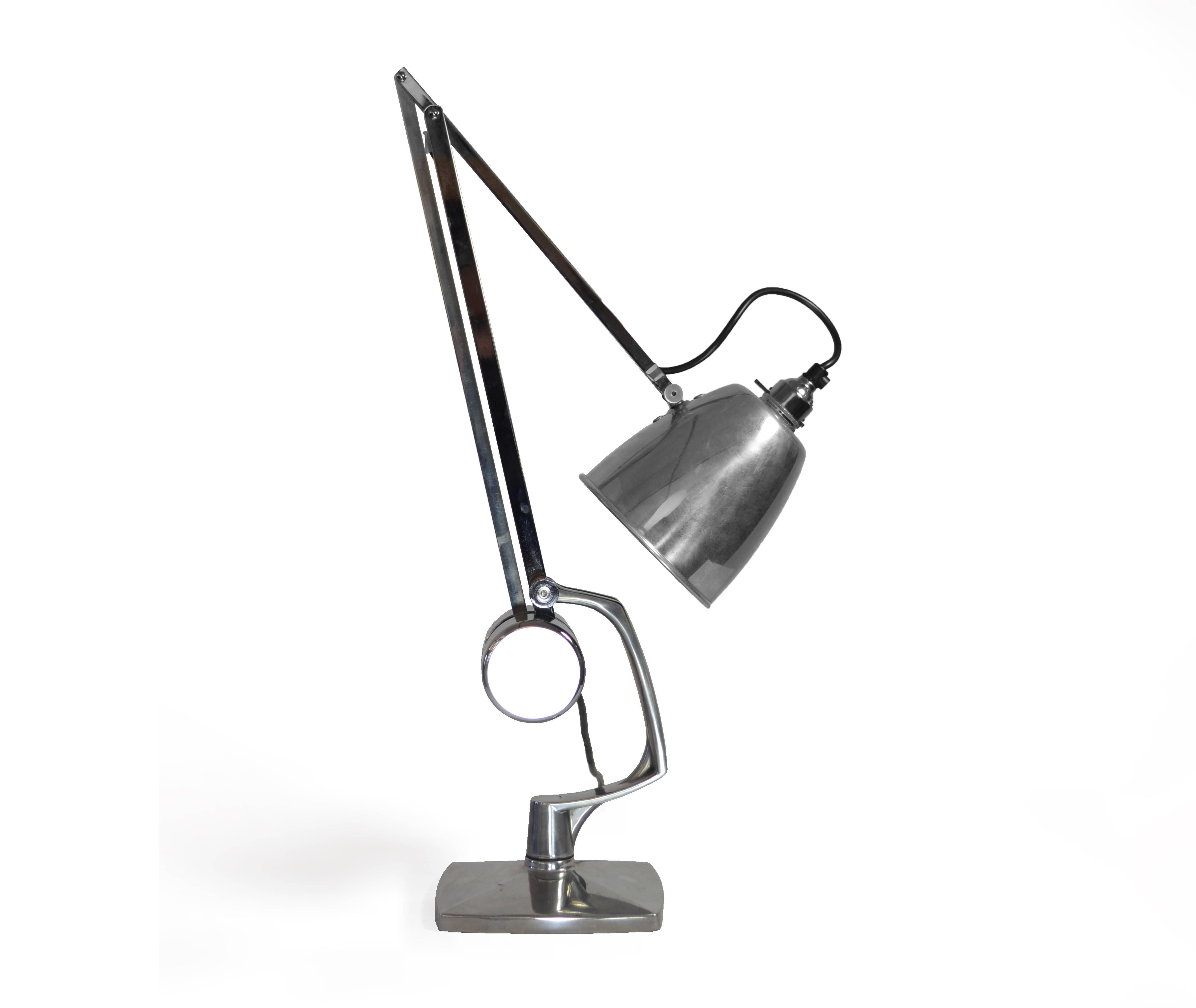 Adjustable metal table lamp by Hadrill & Horstman. Not wired for the US, compatible with British electrical sockets. Works with 40W bulbs. Makers mark visible.

Offered by Neal Beckstedt