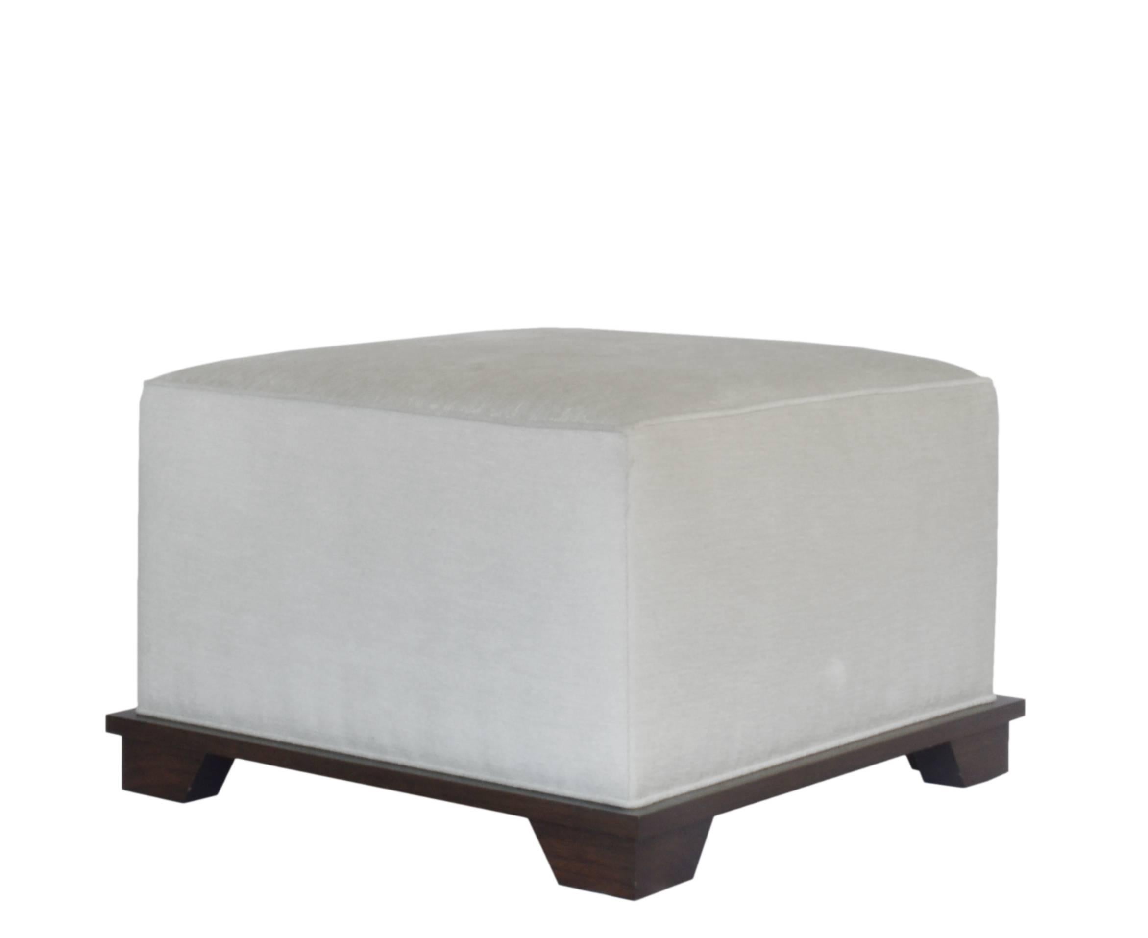 Custom ottoman designed by Neal Beckstedt Studio. Upholstery available in COM/COL.