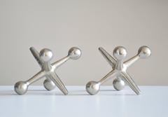 Set of Two Chrome Jacks Sculptures