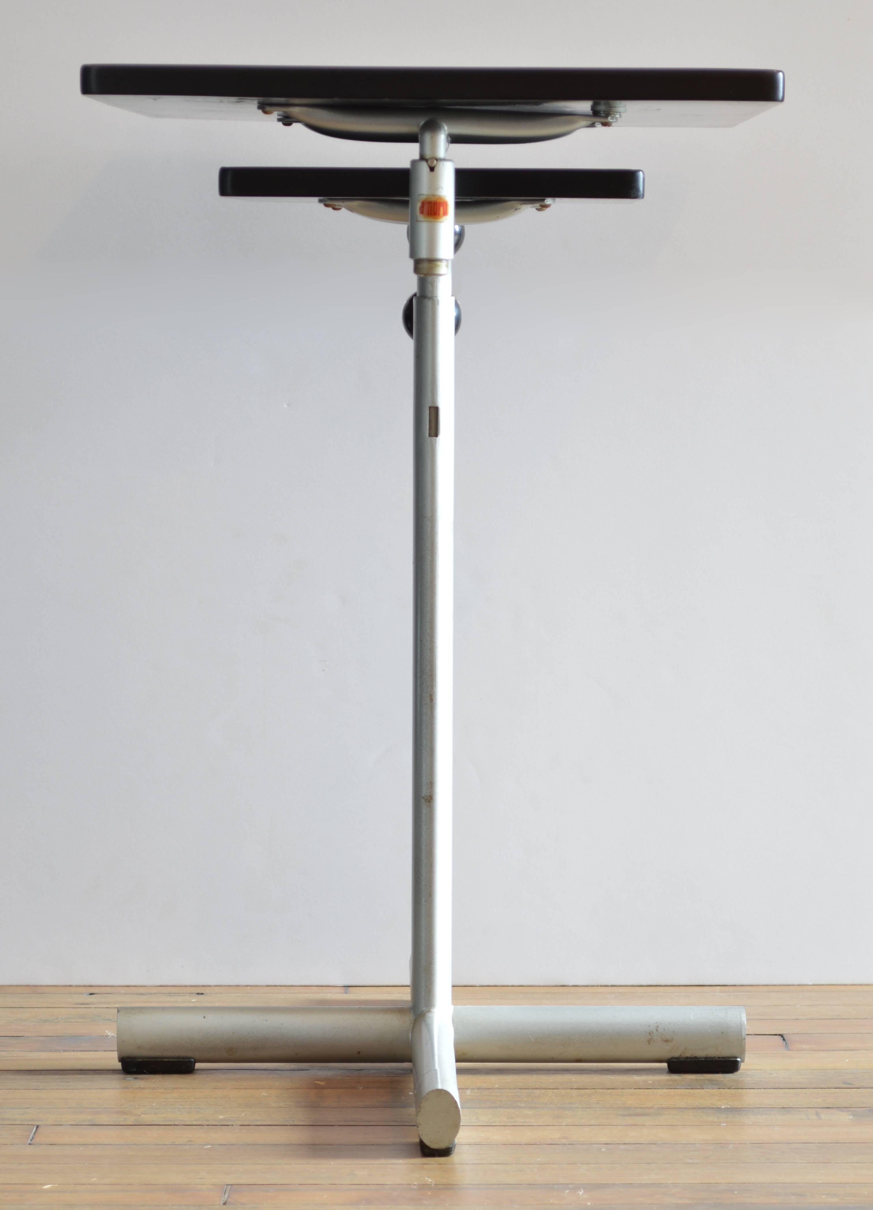 Adjustable work table designed by Swiss designer Werner Max Moser for Embru. Adjustable height, from 27