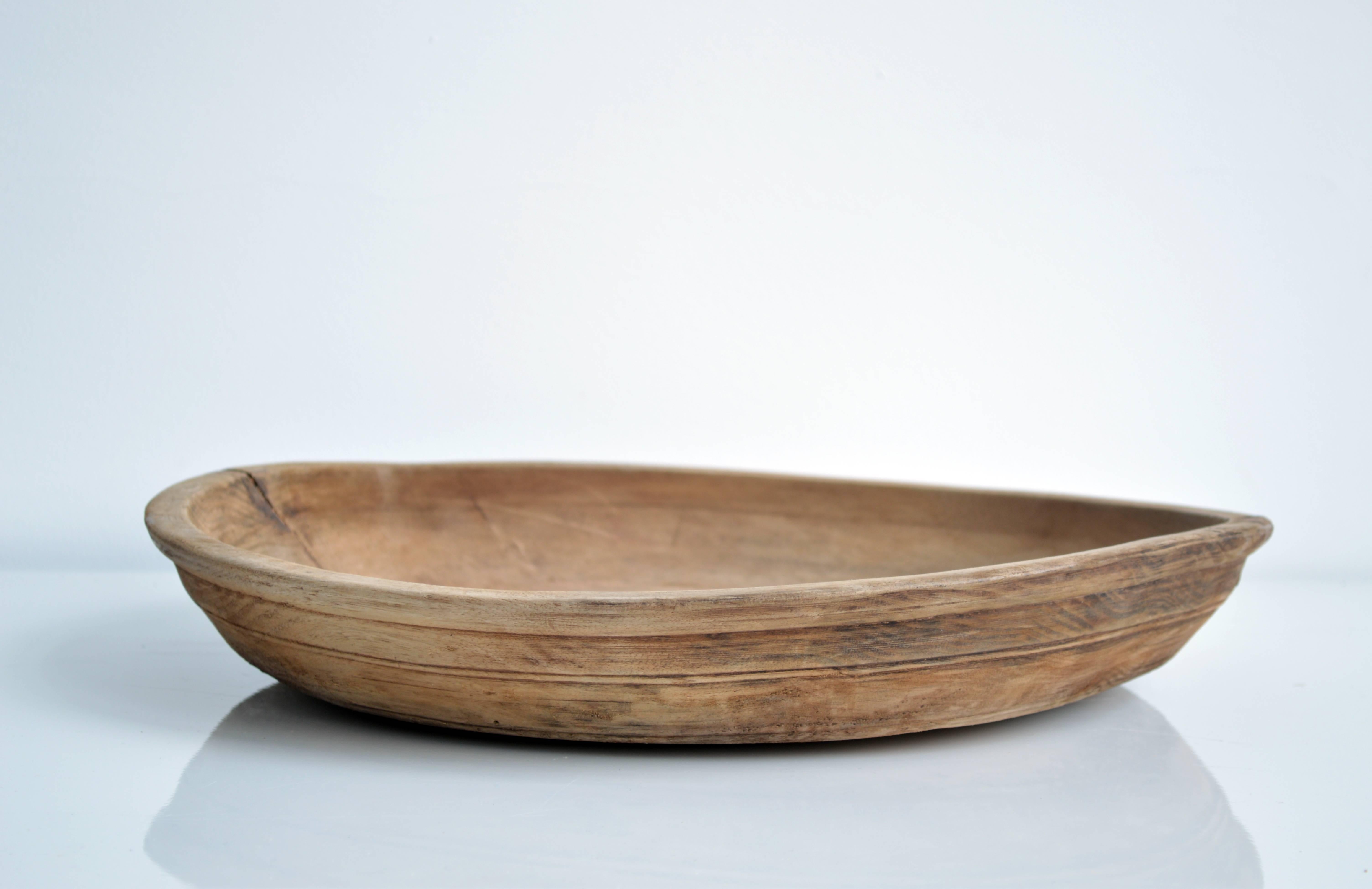 Rustic carved wood bowl, originally from Iran. This piece would make for a beautiful decorative display vessel in any home.