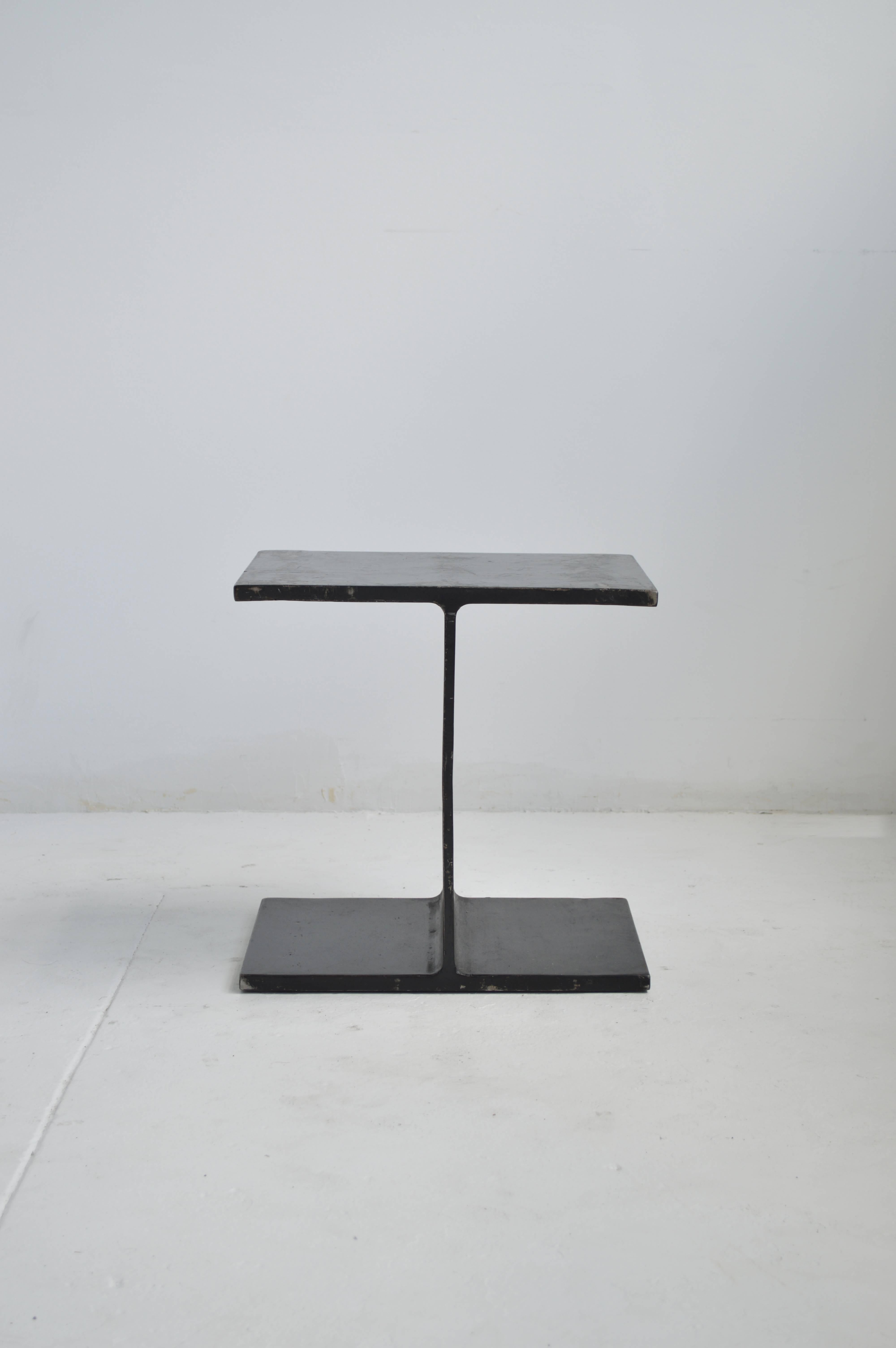 Vintage Ward Bennett black steel 'I-Beam' side table with a lovely patina and some wear to finish which adds to the beauty of the piece. This table embodies the aesthetic of the iconic American designer and is a tribute to his fascination with