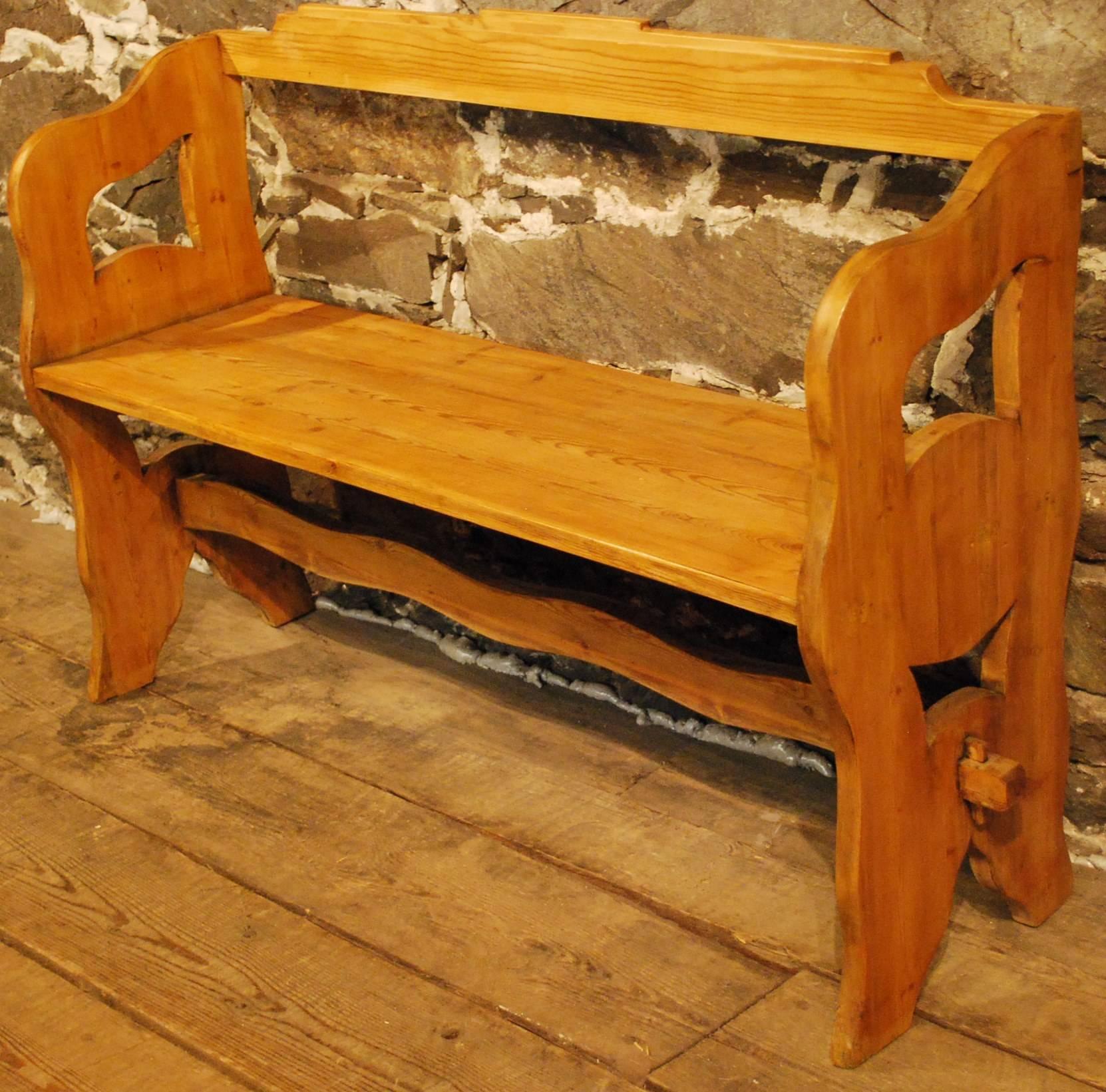 Antique pine bench from Denmark with whimsical organic decoration clearly influenced by the Art Nouveau movement of the time. Hard to find size.