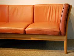 Danish Modern Leather Sofa by Hurup with a Shaped Oak Frame