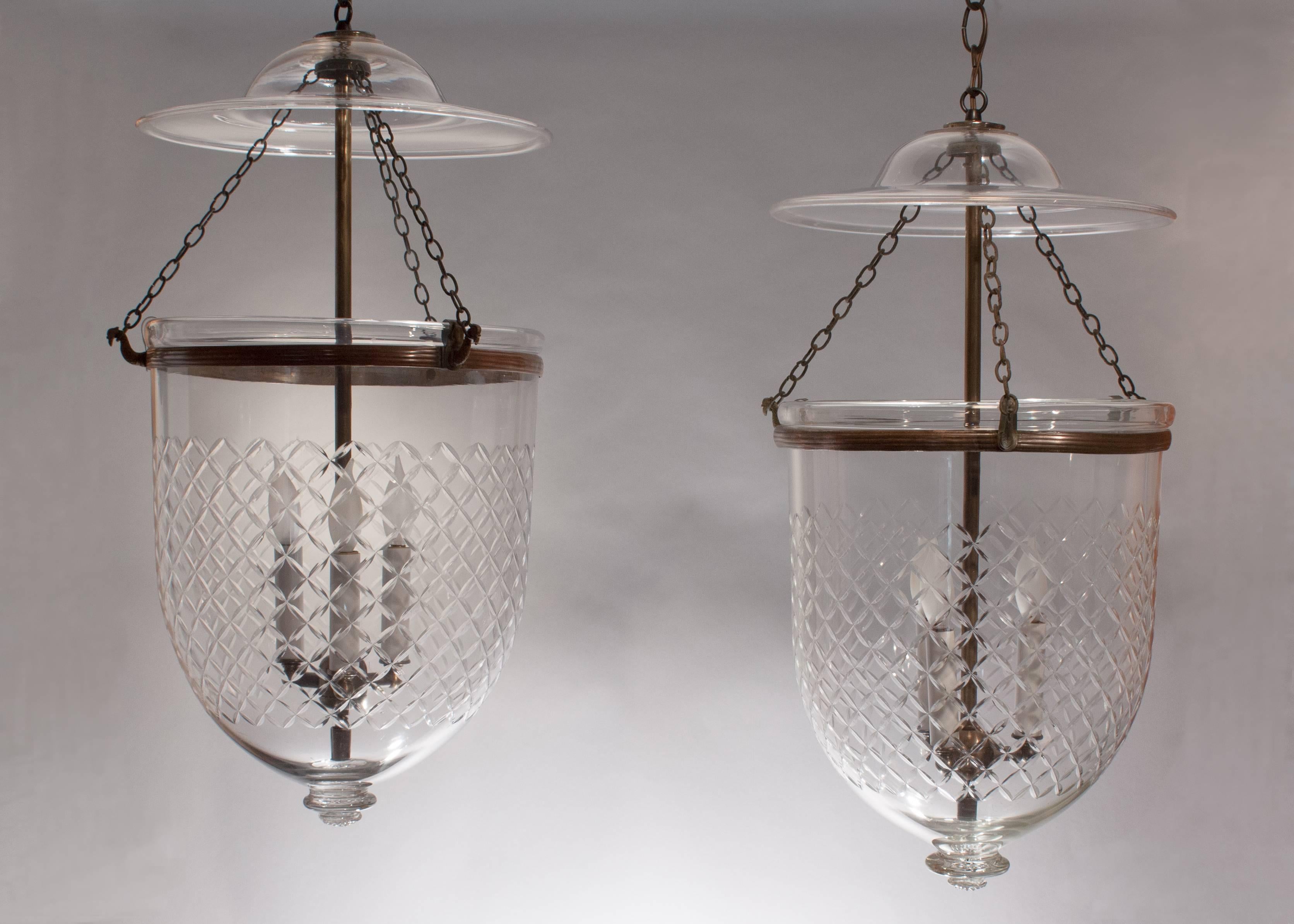 Very lovely, large pair of English handblown bell jar lanterns, circa 1860, with an etched diamond pattern that complements the form of these hall lanterns beautifully. The bell jars are in excellent condition and have all-original fittings,