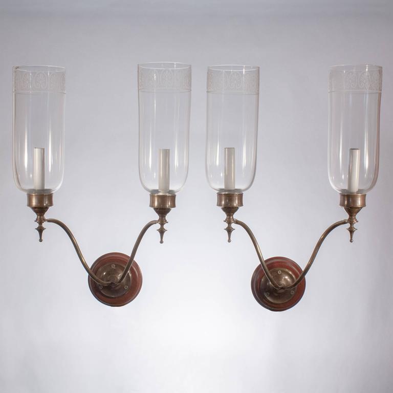 Pair of Double Arm Glass Hurricane Shade Wall Sconces For Sale at 1stdibs