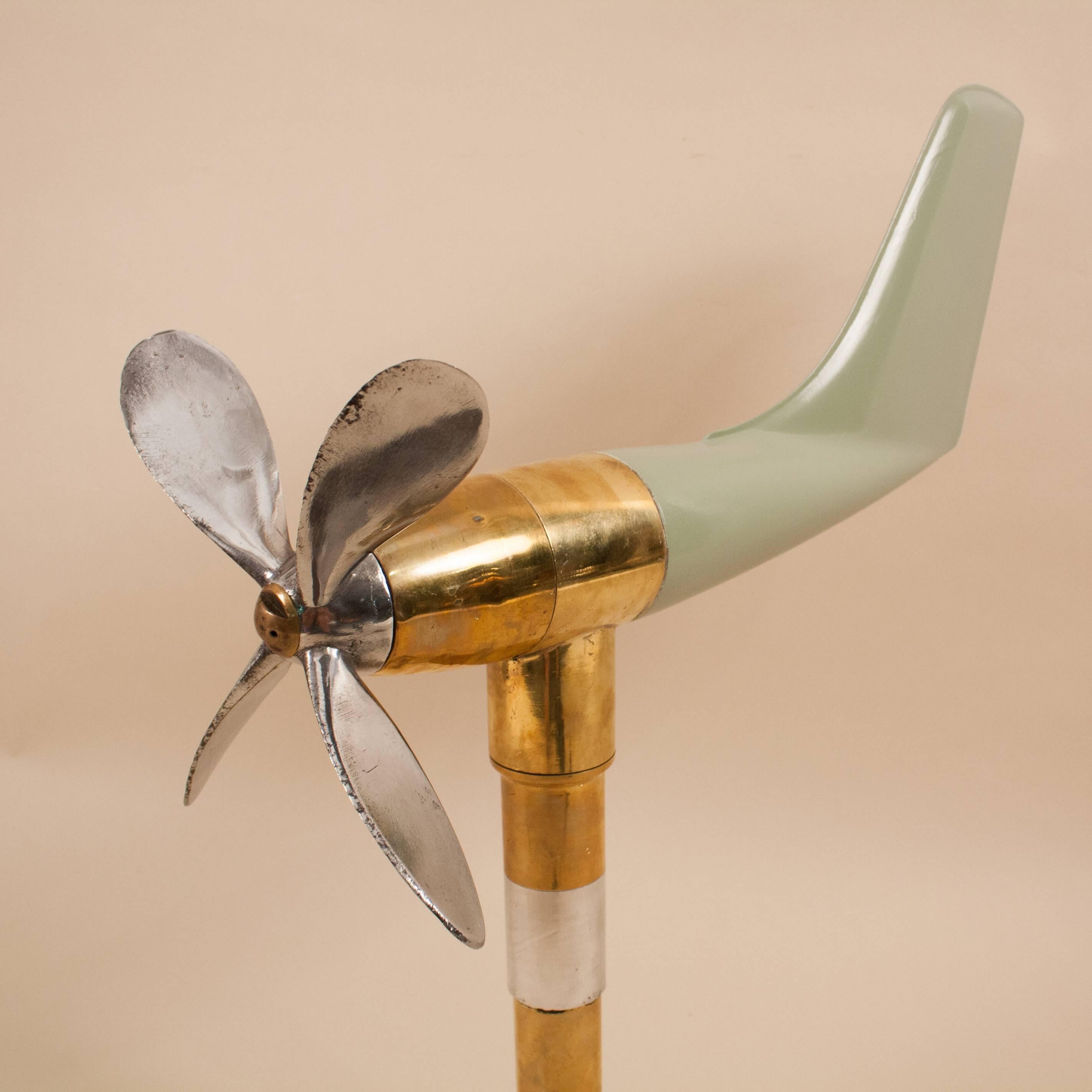 This vintage anemometer, once used to measure wind speed and direction on a boat or airfield, now makes a delightful kinetic sculpture—outdoors or inside. Whether wind- or manually driven, this nautical instrument whirls and twirls without friction.