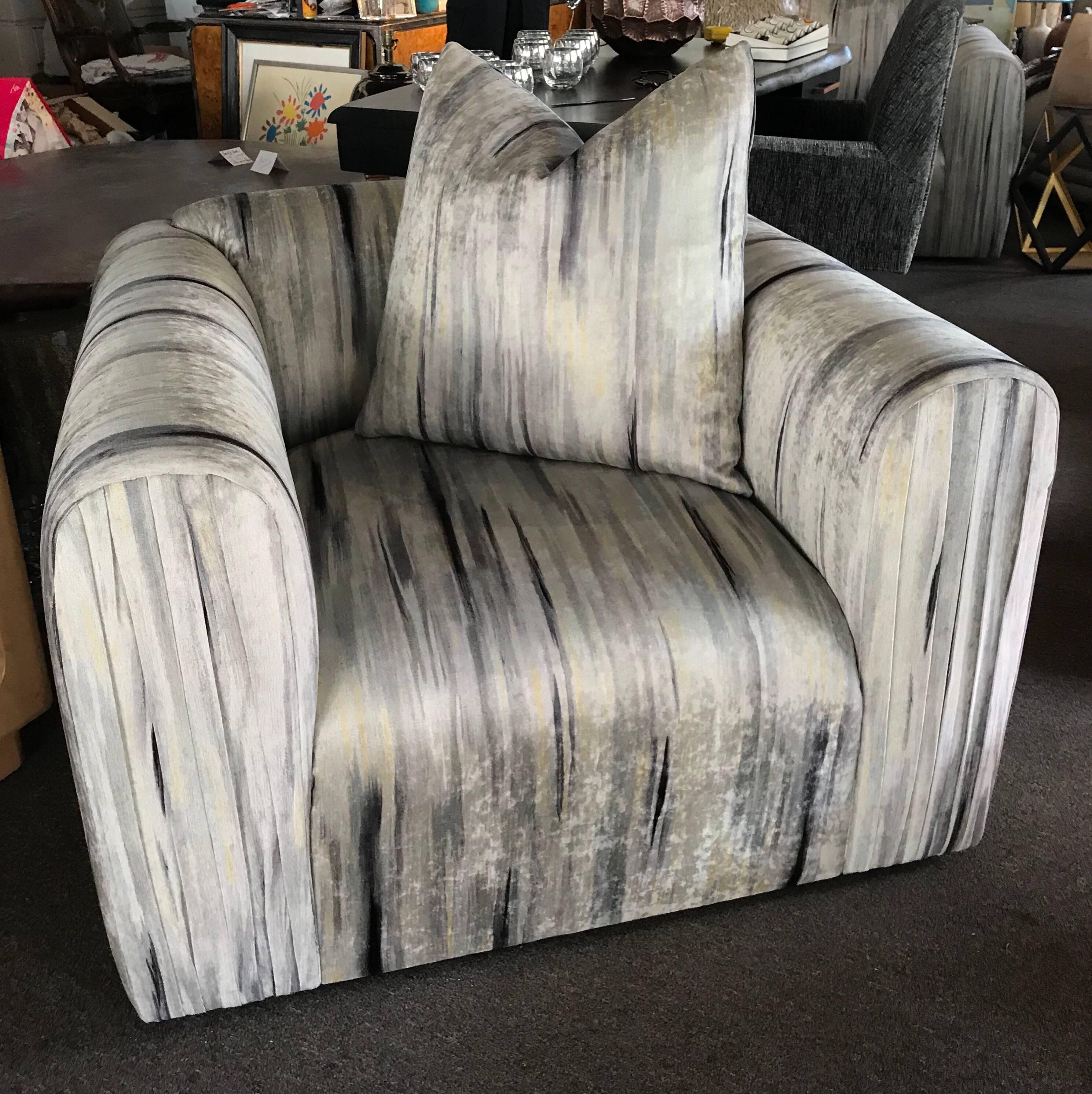 These chairs are newly upholstered in a very high end modern velvet that looks like it was painted in a modern art abstract watercolor. The chairs came from a very upscale Palm Springs Estate. Large and comfortable, the styling of the draped front