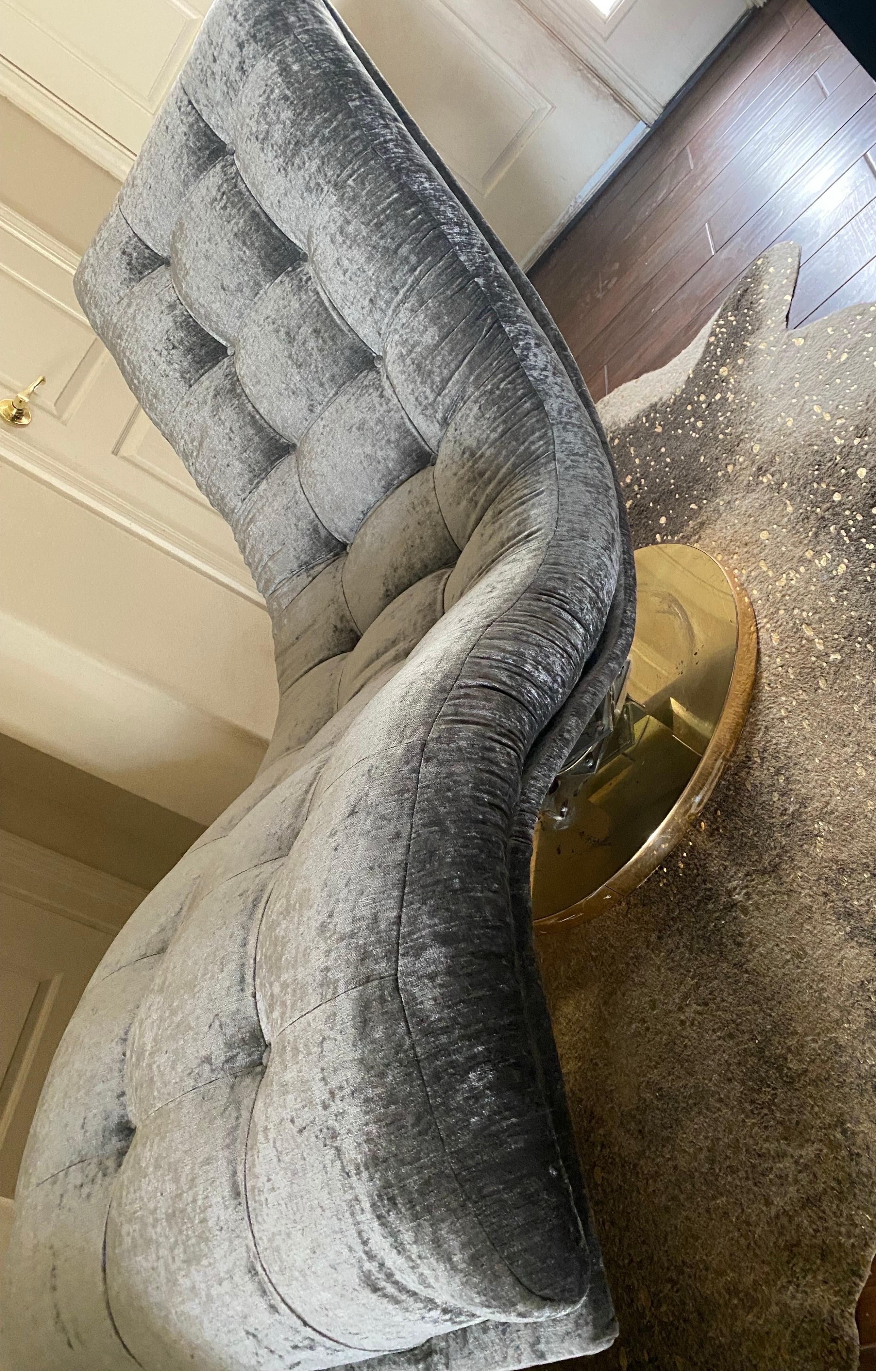 This is the most iconic and collected chase lounge designed by Milo Baughman. The shape and the engineering are amazing. It swivels and rocks. We have reupholstered it in a silver grey antique velvet. We spent over 950.00 on fabric alone: it is the