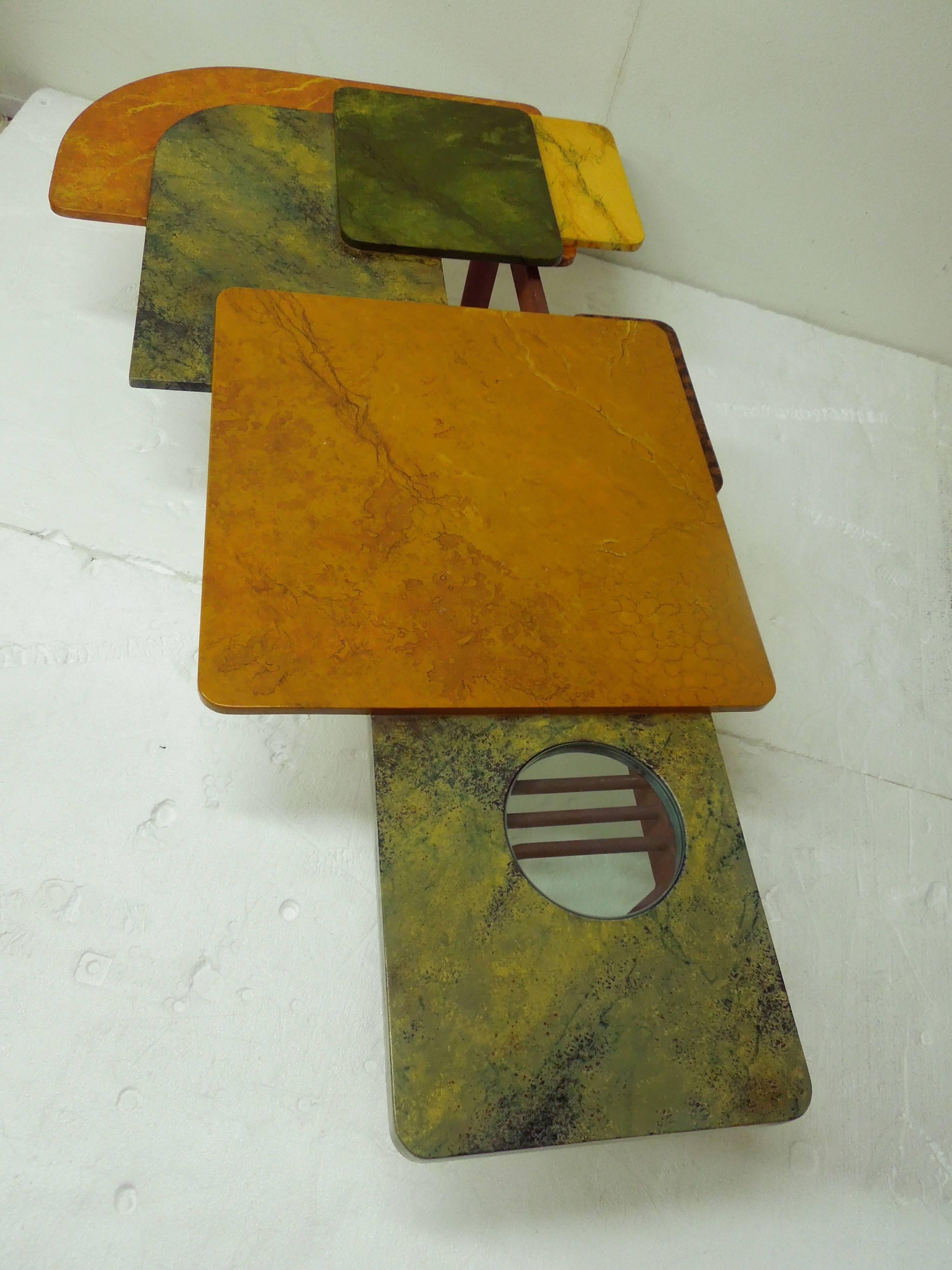 Purchased directly from the estate of Mike Morrison, a one of a kind original coffee table. In varying shapes all hand-painted as he did his canvases. Two-piece with custom rust colored modernist iron base. Top fits perfectly on base with see