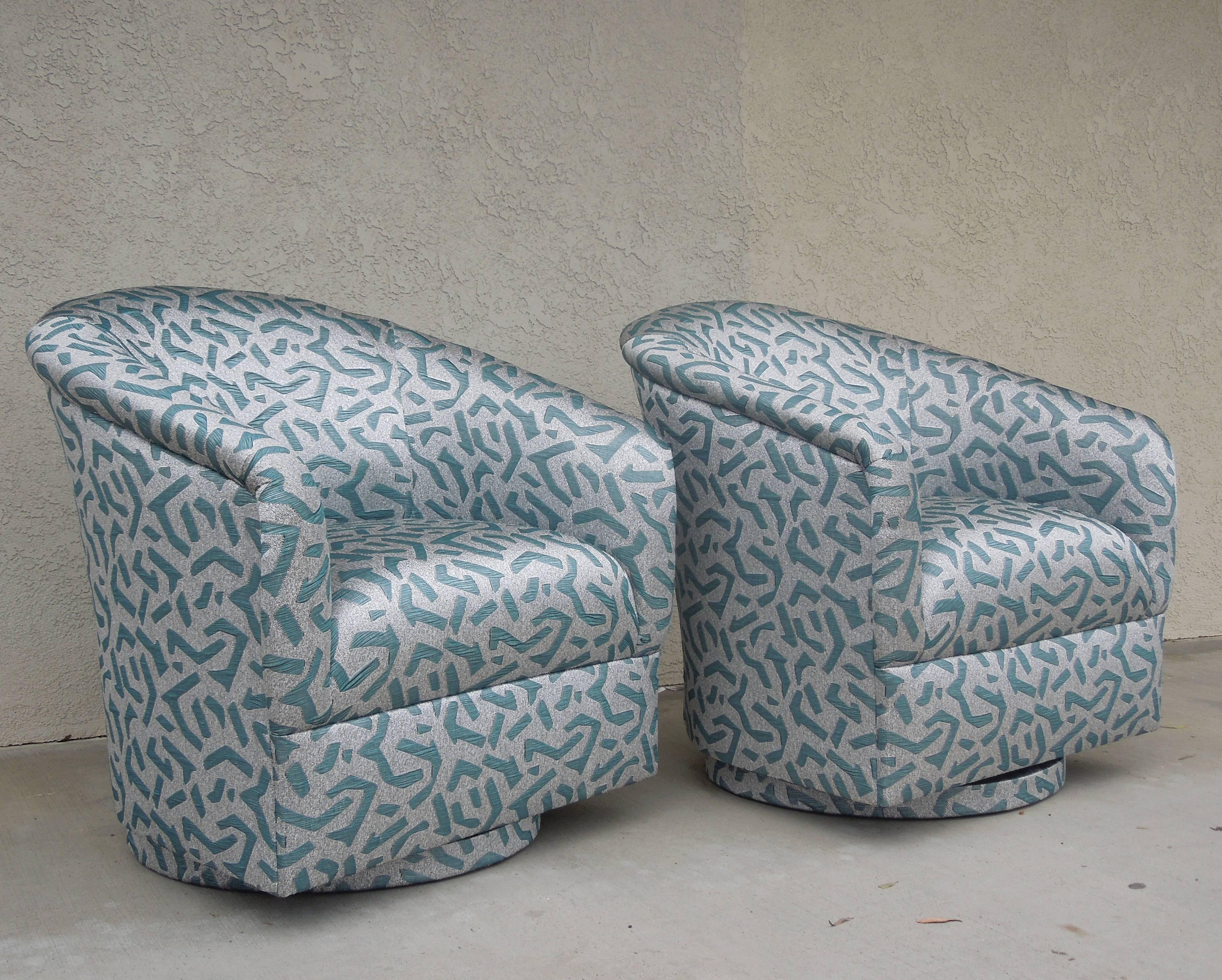 Newly upholstered in super high end European Jaquard in silver and turquoise mettalic 