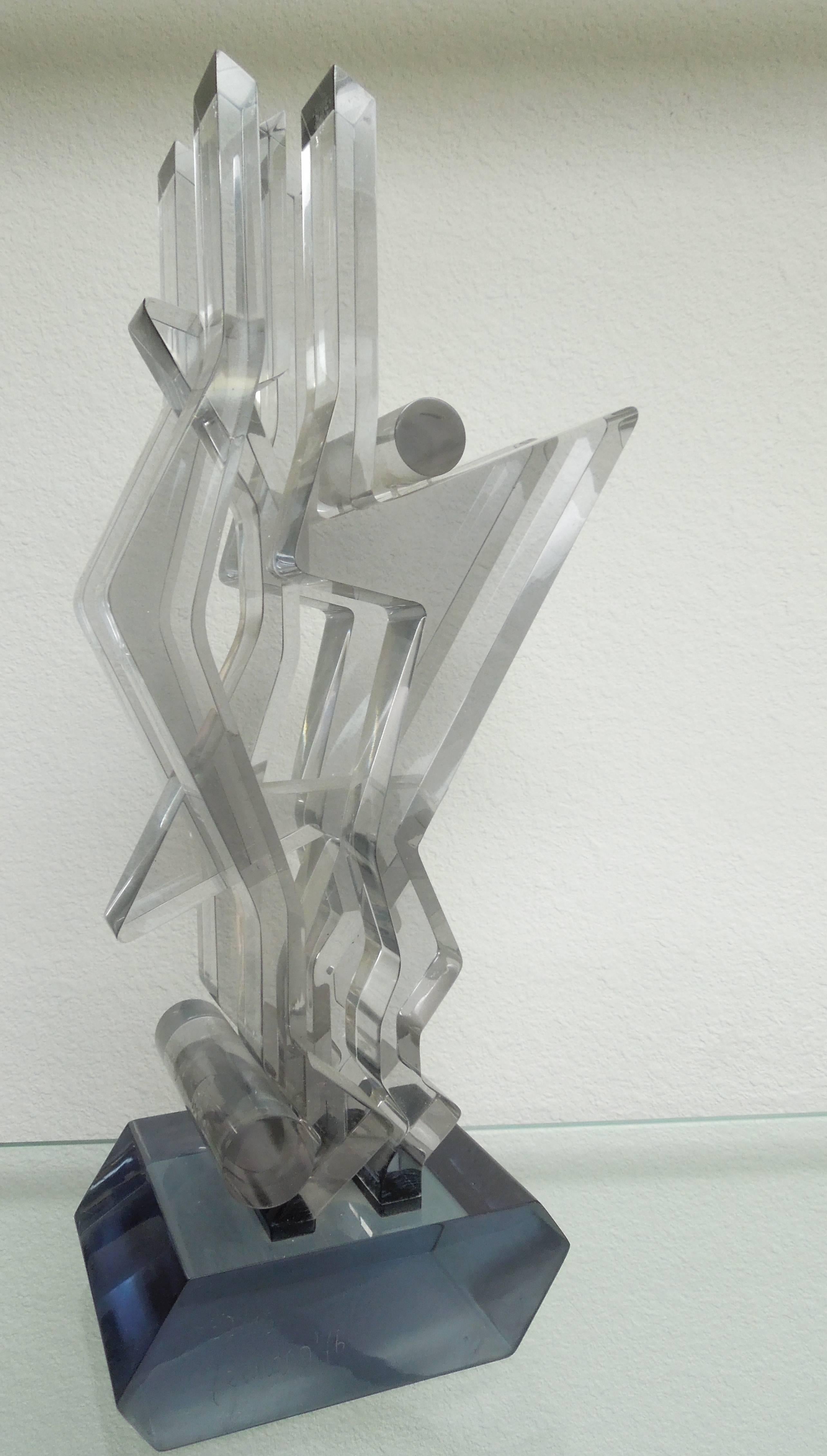From a prominent Palm Springs Art Collector's estate is a platinum and charcoal colored Lucite sculpture by Italian Modernist Artist Giorgio Zennaro (Venezia, 10 ottobre 1926, Venezia, 13 agosto 2005) Signed/dated/numbered. 1976. #39/75. Very multi